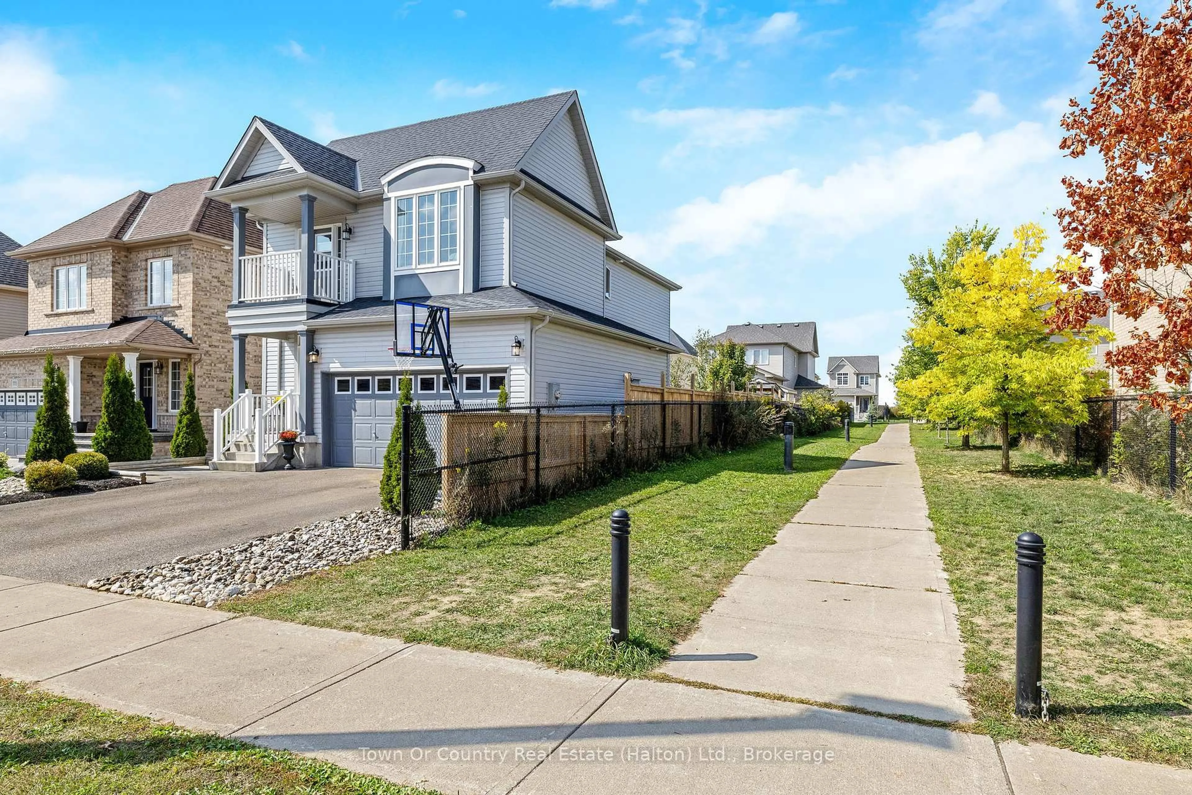 Home with vinyl exterior material, street for 111 Ryan St, Centre Wellington Ontario N1M 0E4