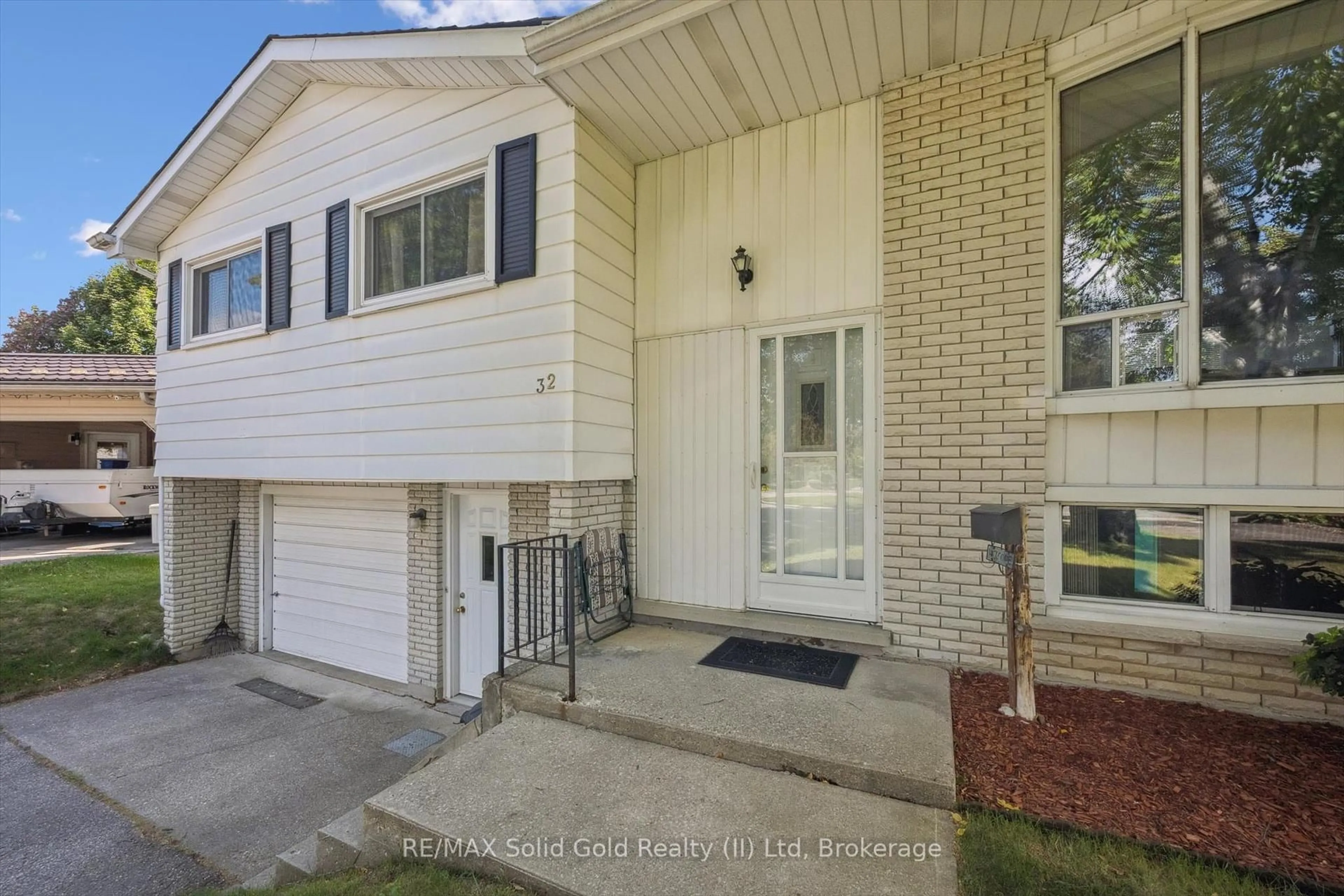 Home with vinyl exterior material, street for 32 Lambert Pl, Kitchener Ontario N2A 1N1