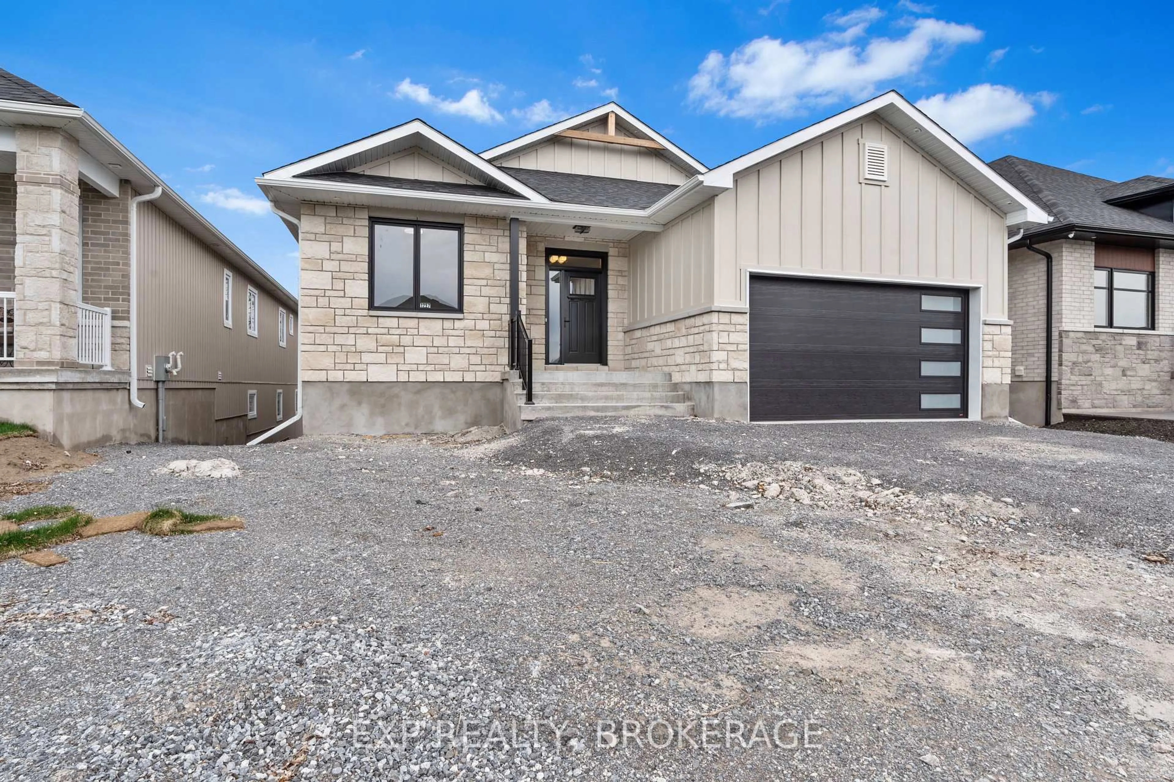 Home with brick exterior material, street for 1257 CARFA Cres, Kingston Ontario K7P 0M7
