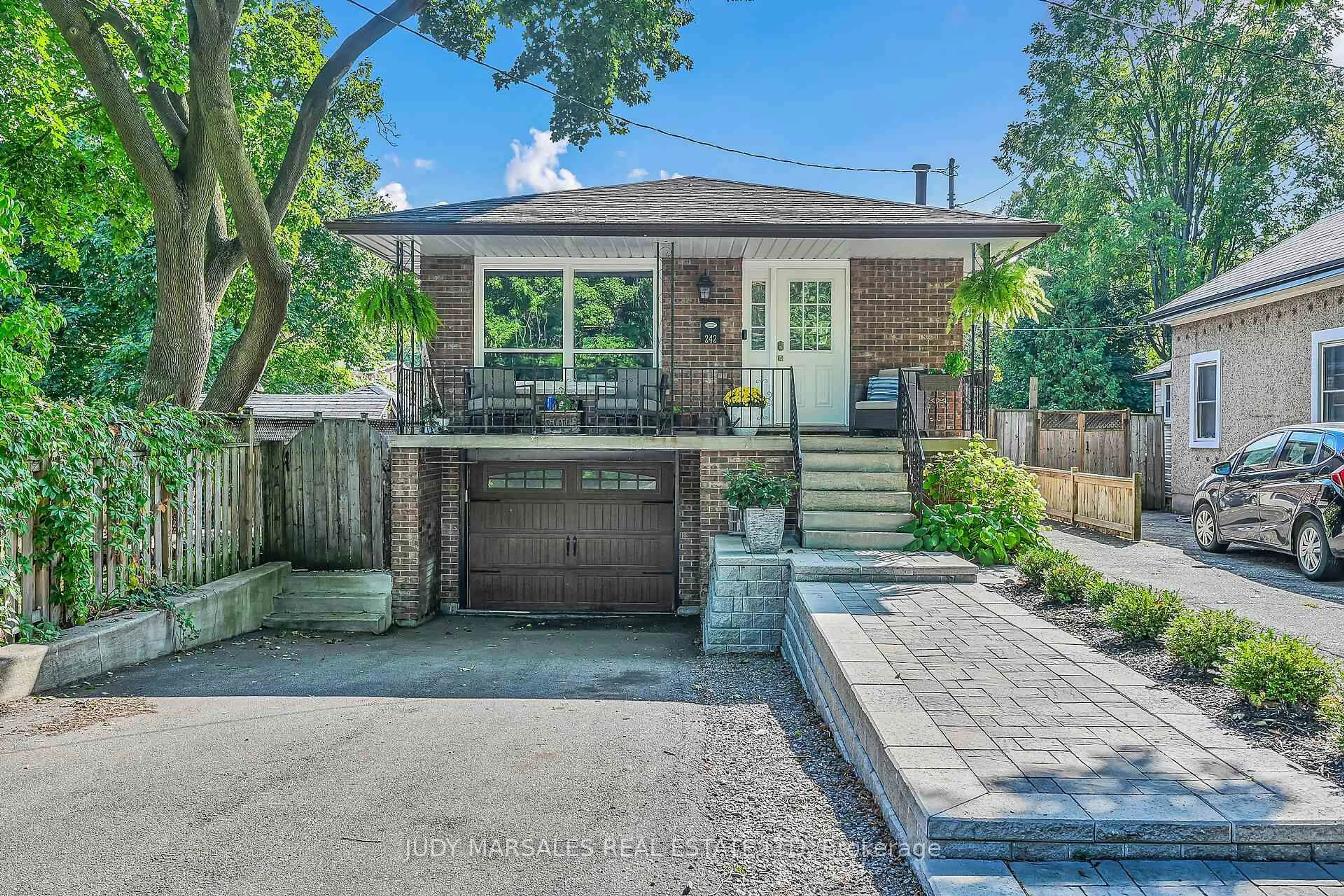 Home with brick exterior material, street for 242 Macnab St, Hamilton Ontario L9H 2K3