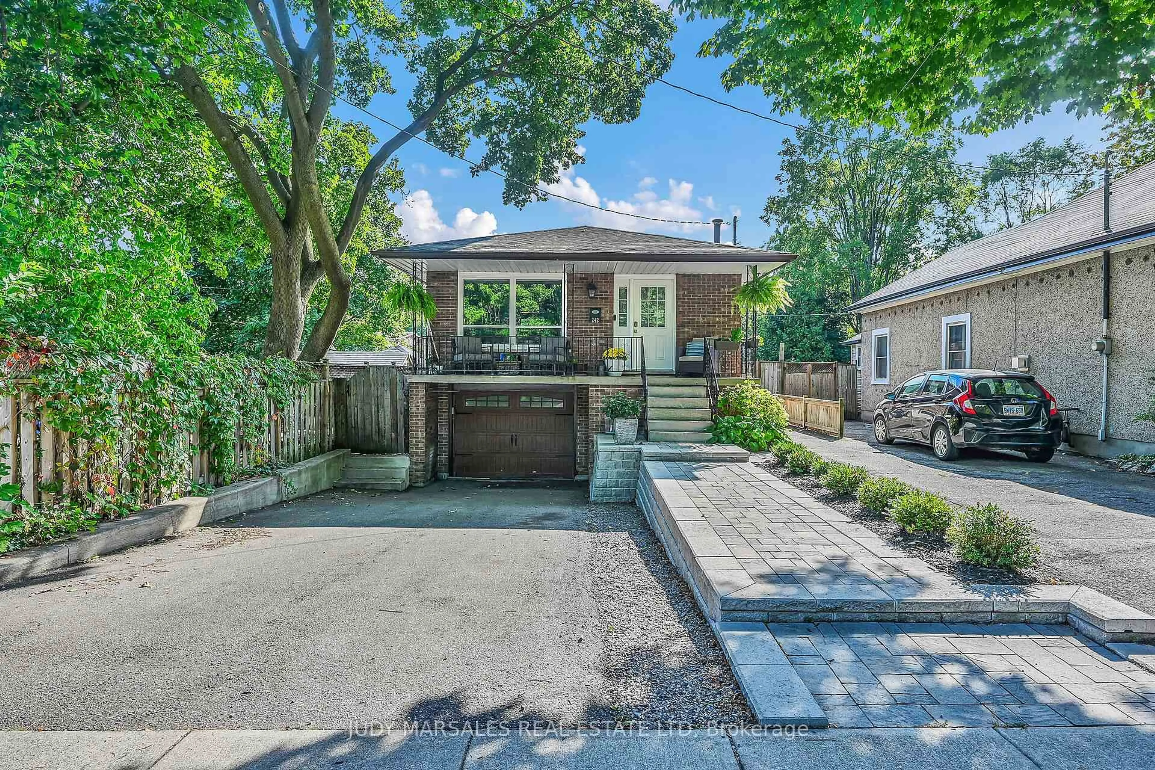 Home with brick exterior material, street for 242 Macnab St, Hamilton Ontario L9H 2K3