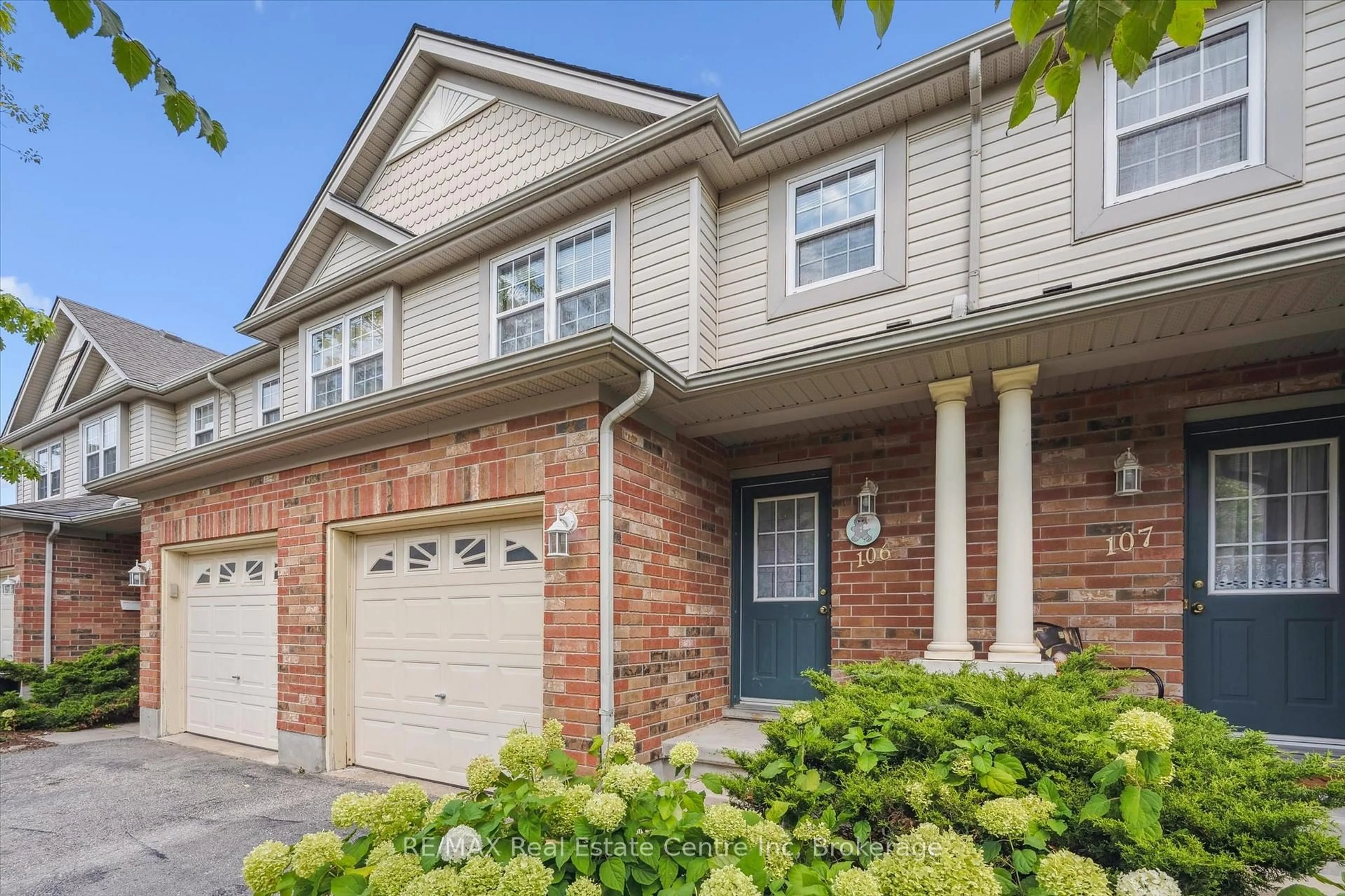 Home with brick exterior material, street for 30 IMPERIAL Rd #106, Guelph Ontario N1K 1Y1