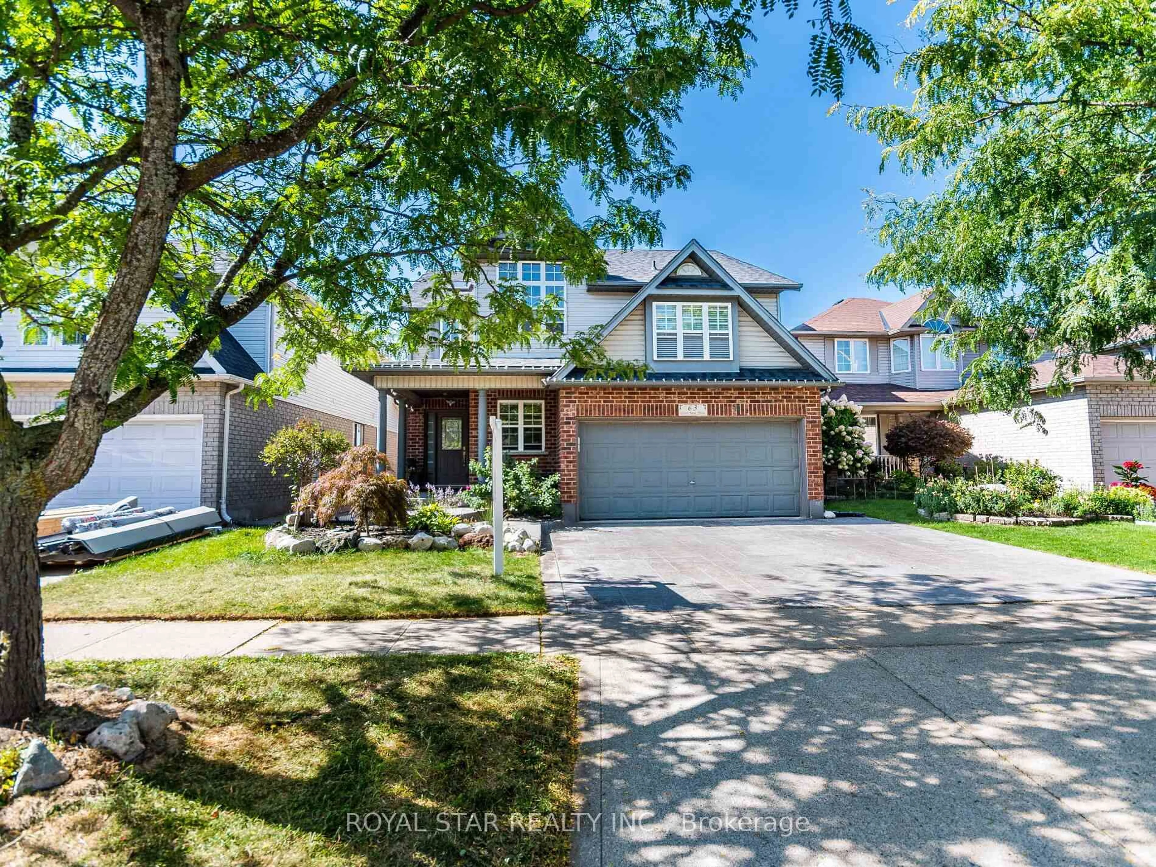 Home with brick exterior material, street for 63 Green Bank Dr, Cambridge Ontario N1T 2B4