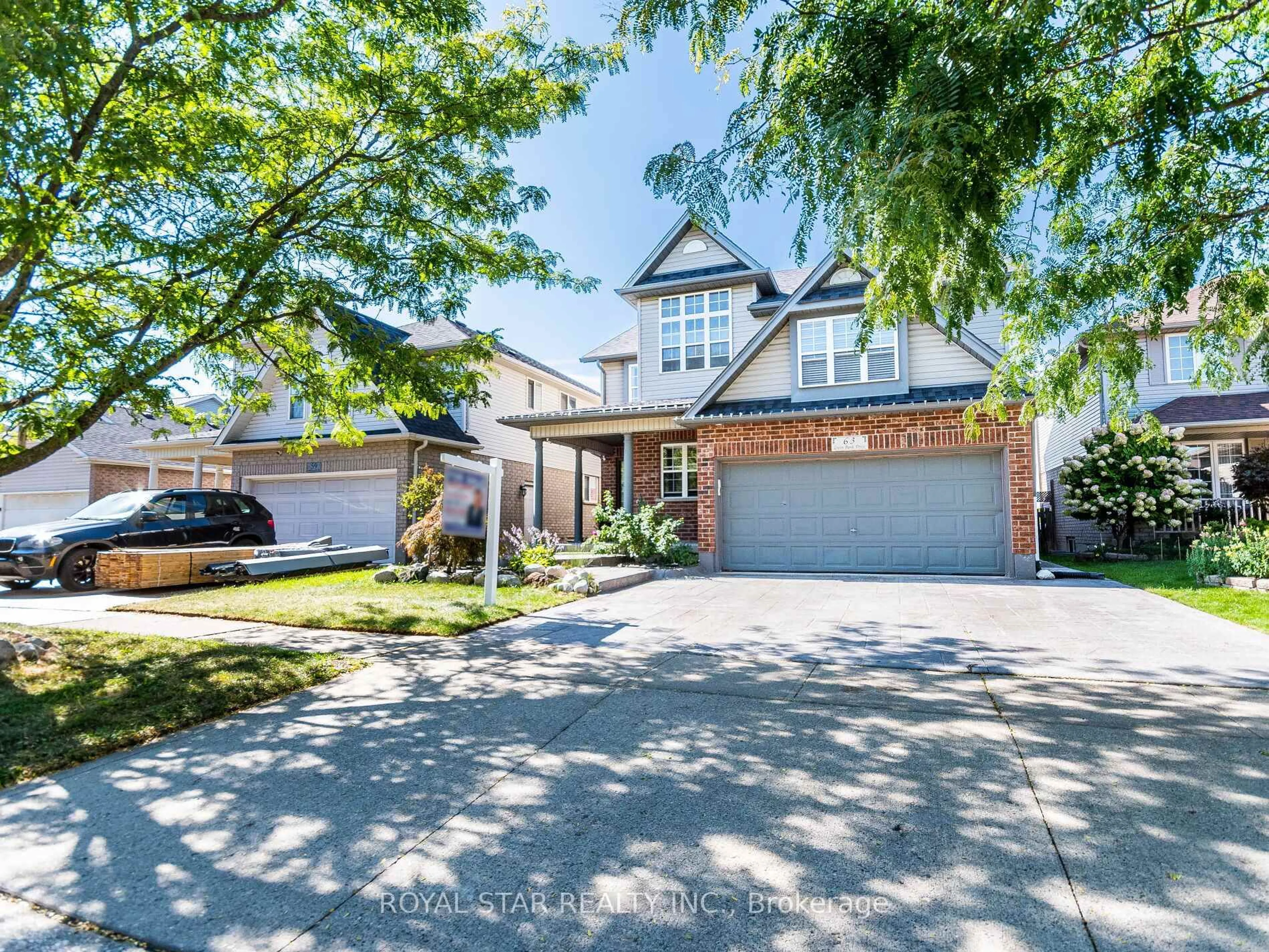 Home with brick exterior material, street for 63 Green Bank Dr, Cambridge Ontario N1T 2B4