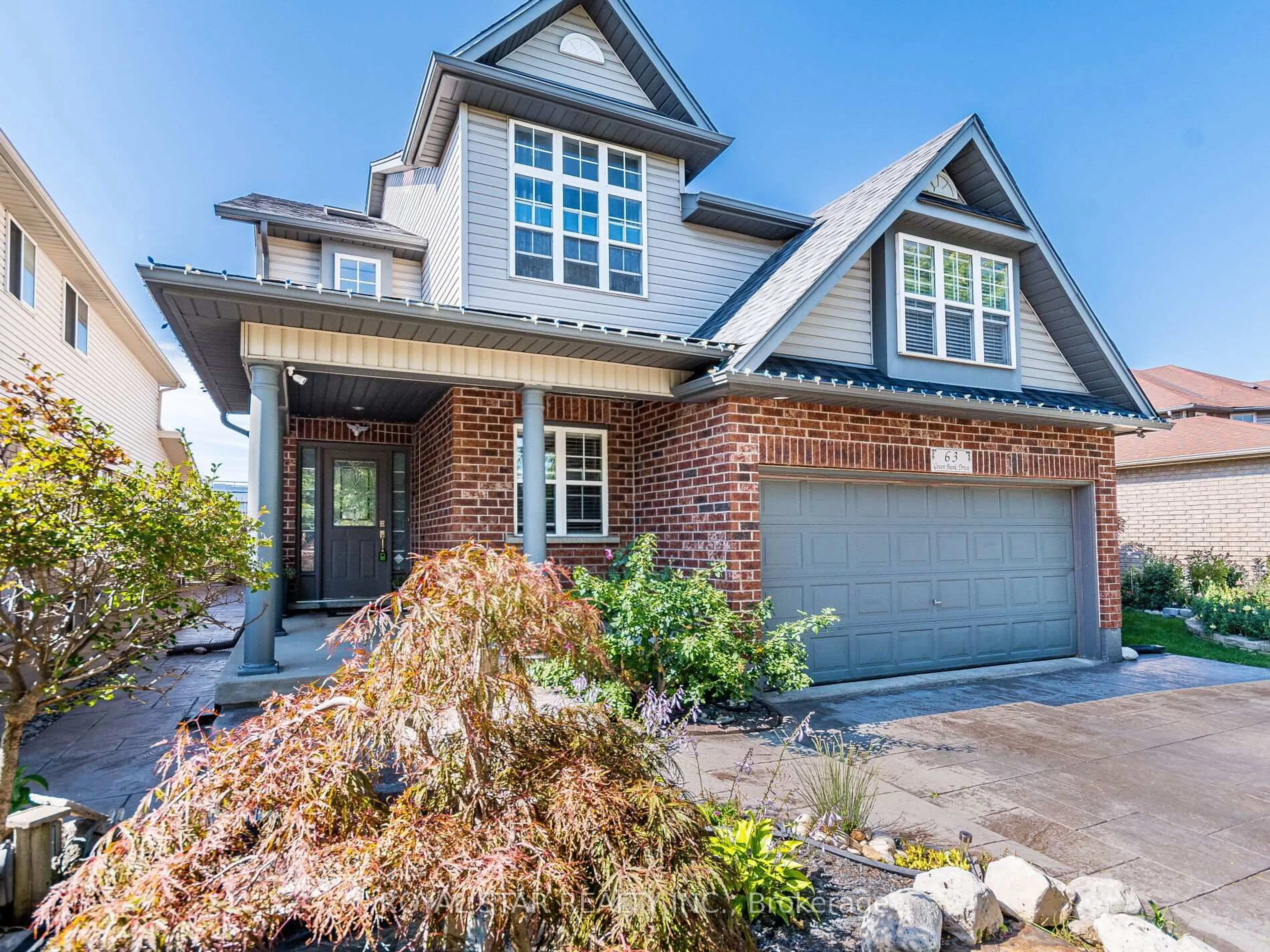 Home with brick exterior material, street for 63 Green Bank Dr, Cambridge Ontario N1T 2B4