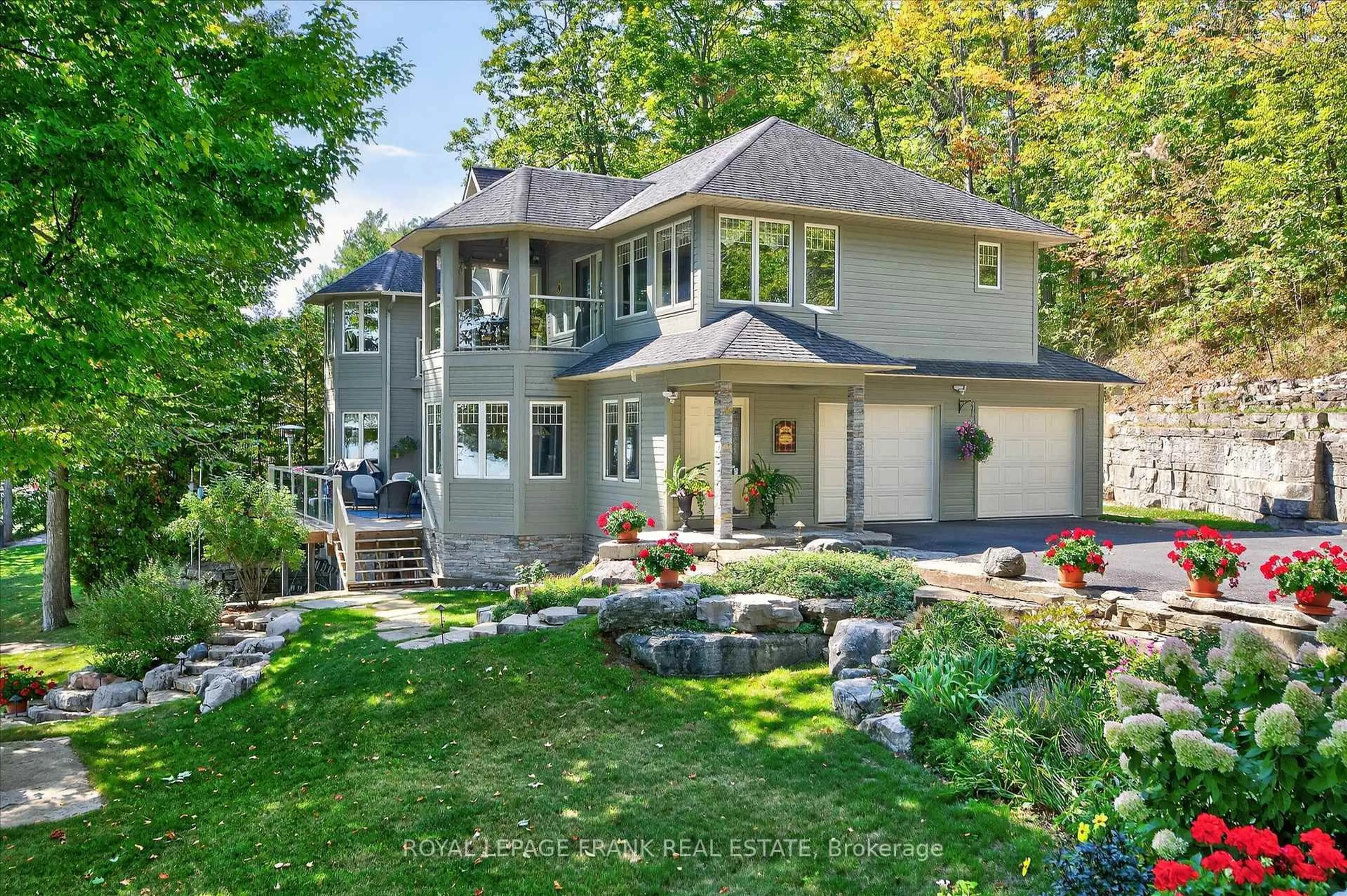 Home with brick exterior material, street for 3081 Beachwood Dr, Selwyn Ontario K0L 2H0
