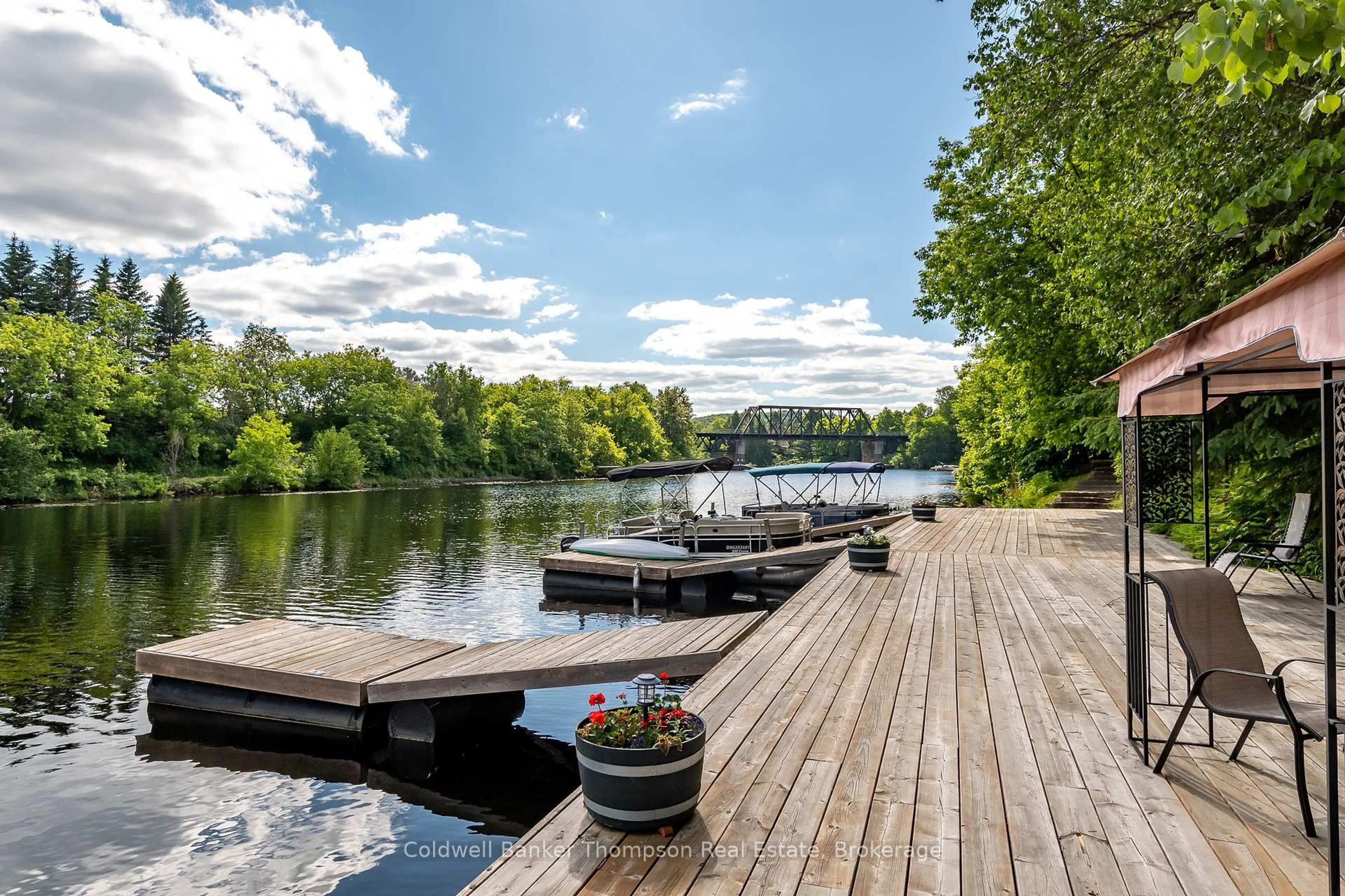 Patio, water/lake/river/ocean view for 31 Dairy Lane #203, Huntsville Ontario P1H 2L7