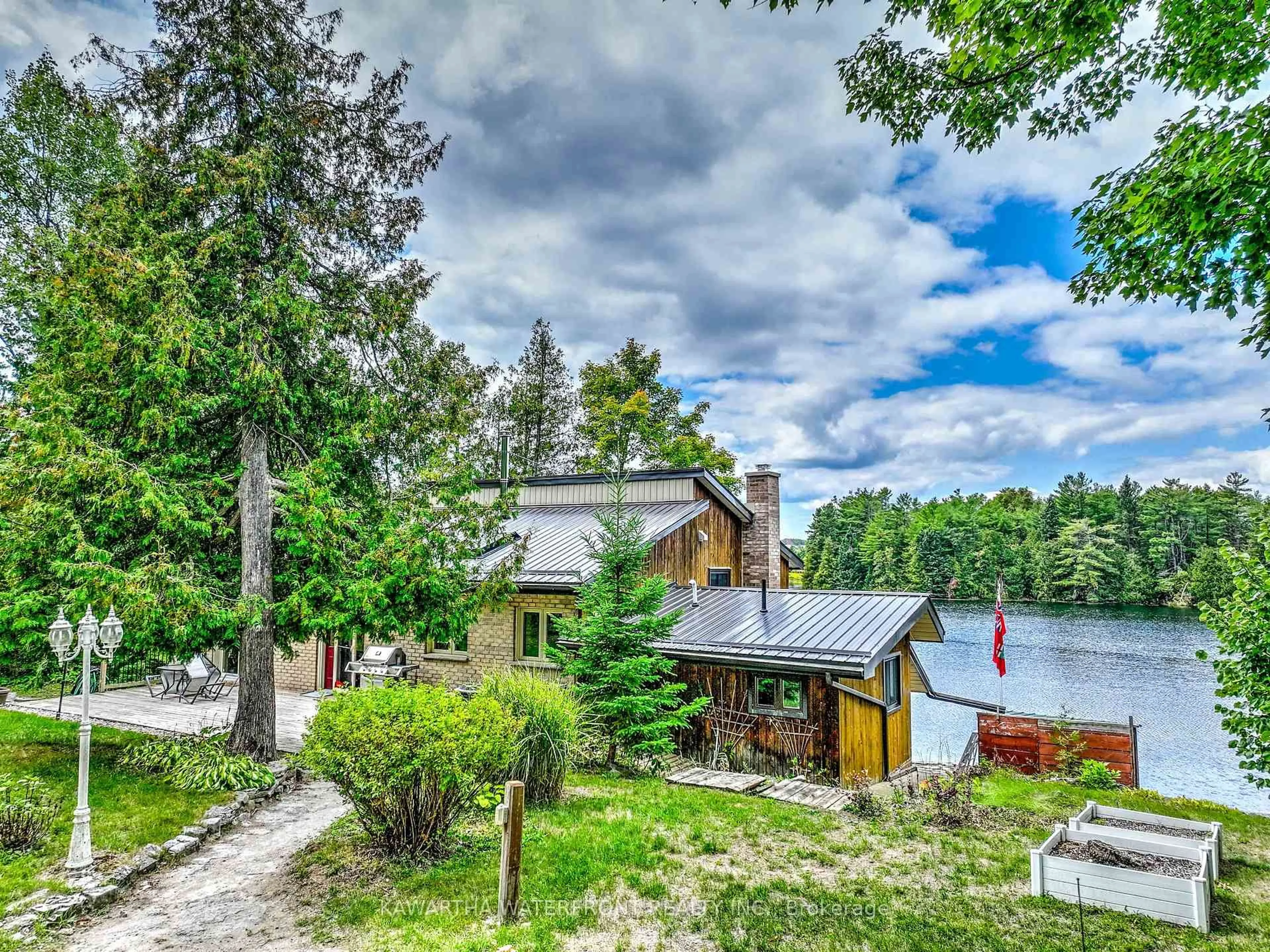 A pic from outside/outdoor area/front of a property/back of a property/a pic from drone, water/lake/river/ocean view for 31 Shadow Lake 40 Rd, Kawartha Lakes Ontario K0M 1K0