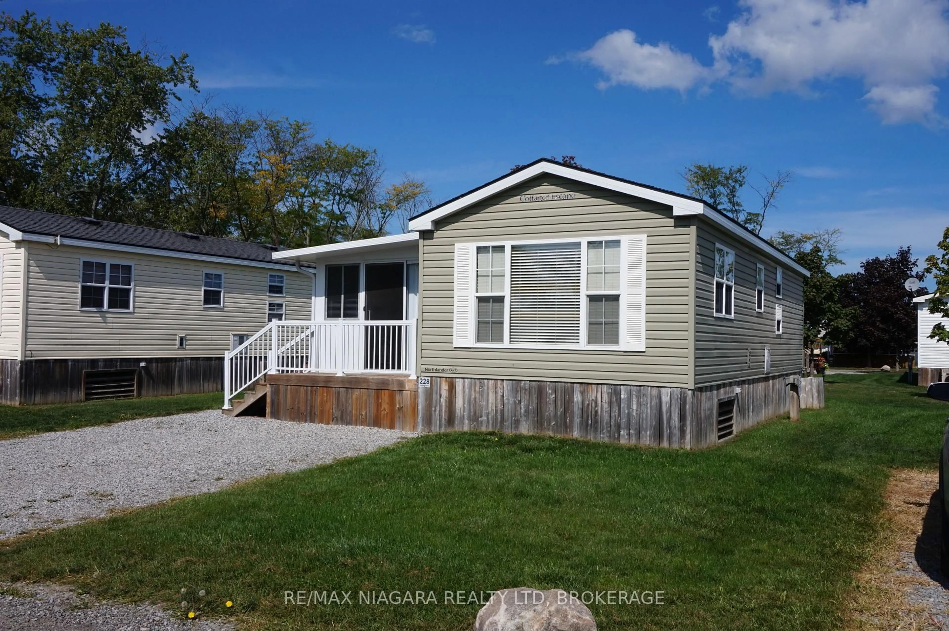 Home with vinyl exterior material, street for 1501 Line 8 Rd #228, Niagara-on-the-Lake Ontario L0S 1L0
