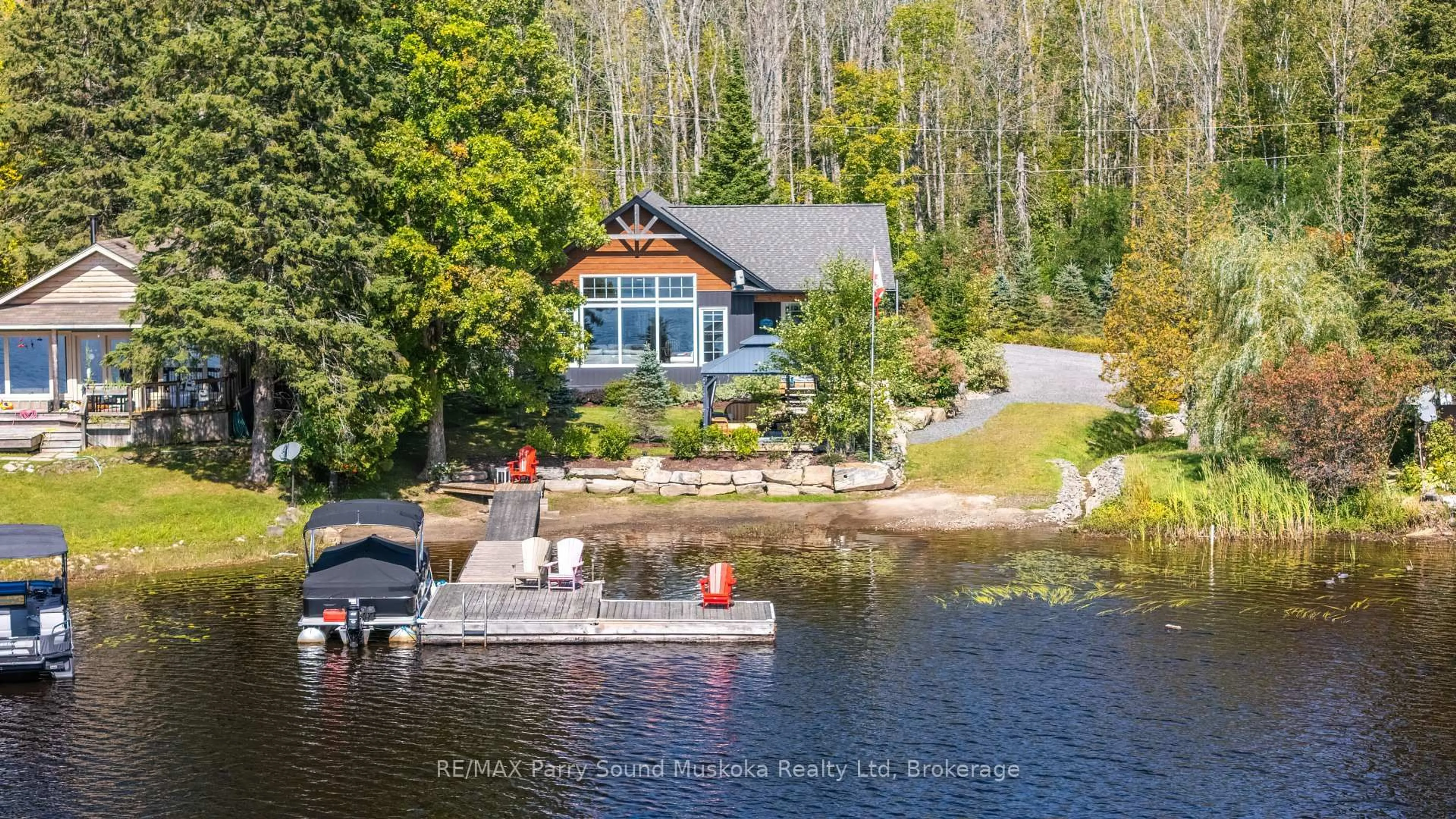 A pic from outside/outdoor area/front of a property/back of a property/a pic from drone, water/lake/river/ocean view for 40 & 41 Sunset Cove Rd, Seguin Ontario P2A 0B6