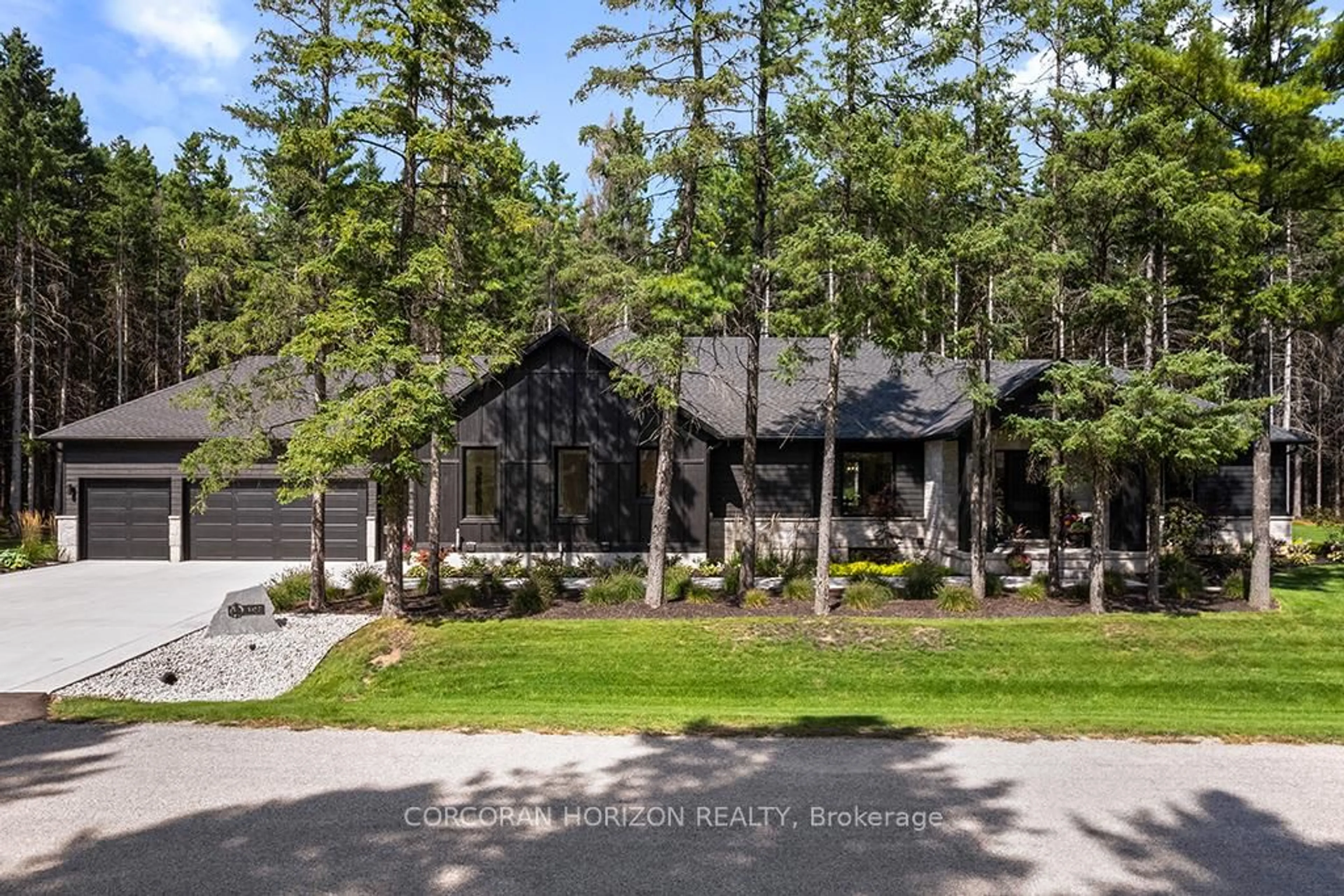 A pic from outside/outdoor area/front of a property/back of a property/a pic from drone, forest/trees view for 107 Louise Creek Cres, West Grey Ontario N0G 1S0