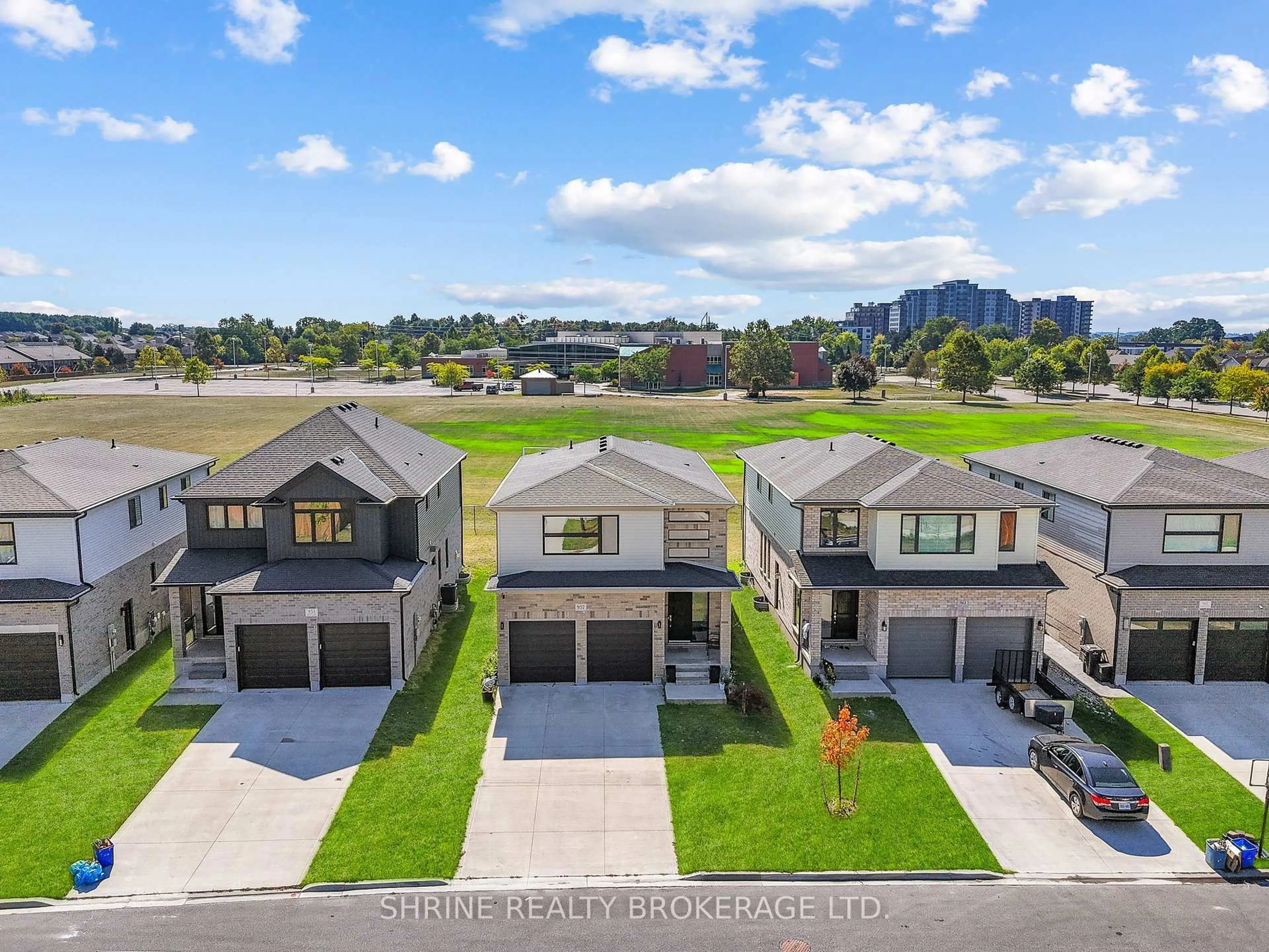 A pic from outside/outdoor area/front of a property/back of a property/a pic from drone, water/lake/river/ocean view for 957 Holtby Crt, London North Ontario N6G 0W9