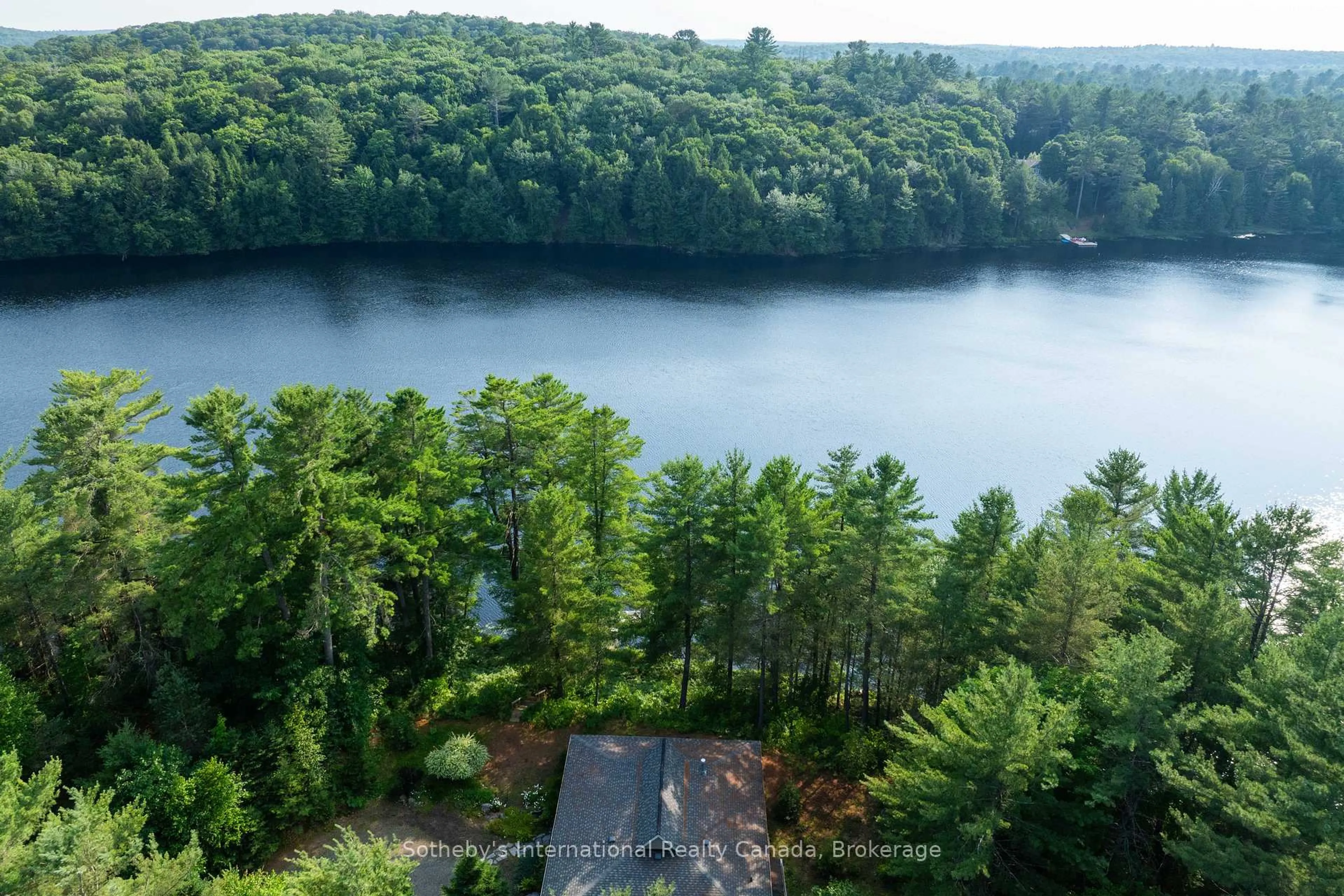 A pic from outside/outdoor area/front of a property/back of a property/a pic from drone, water/lake/river/ocean view for 176 Ripple & Palette Lake Rd, Huntsville Ontario P1H 2J4