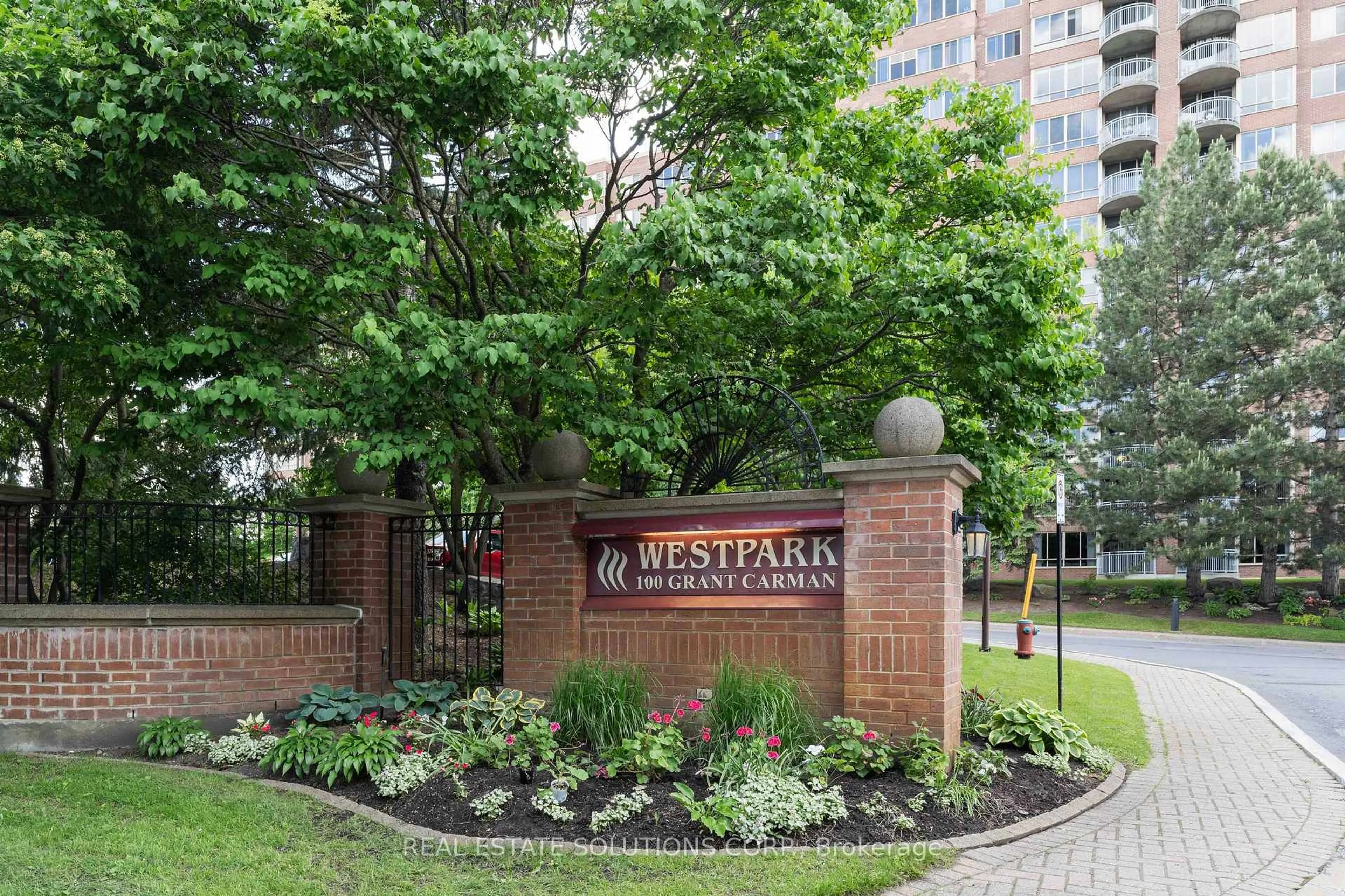 Patio, street for 100 Grant Carman Dr #214, Ottawa Ontario K2E 8B8