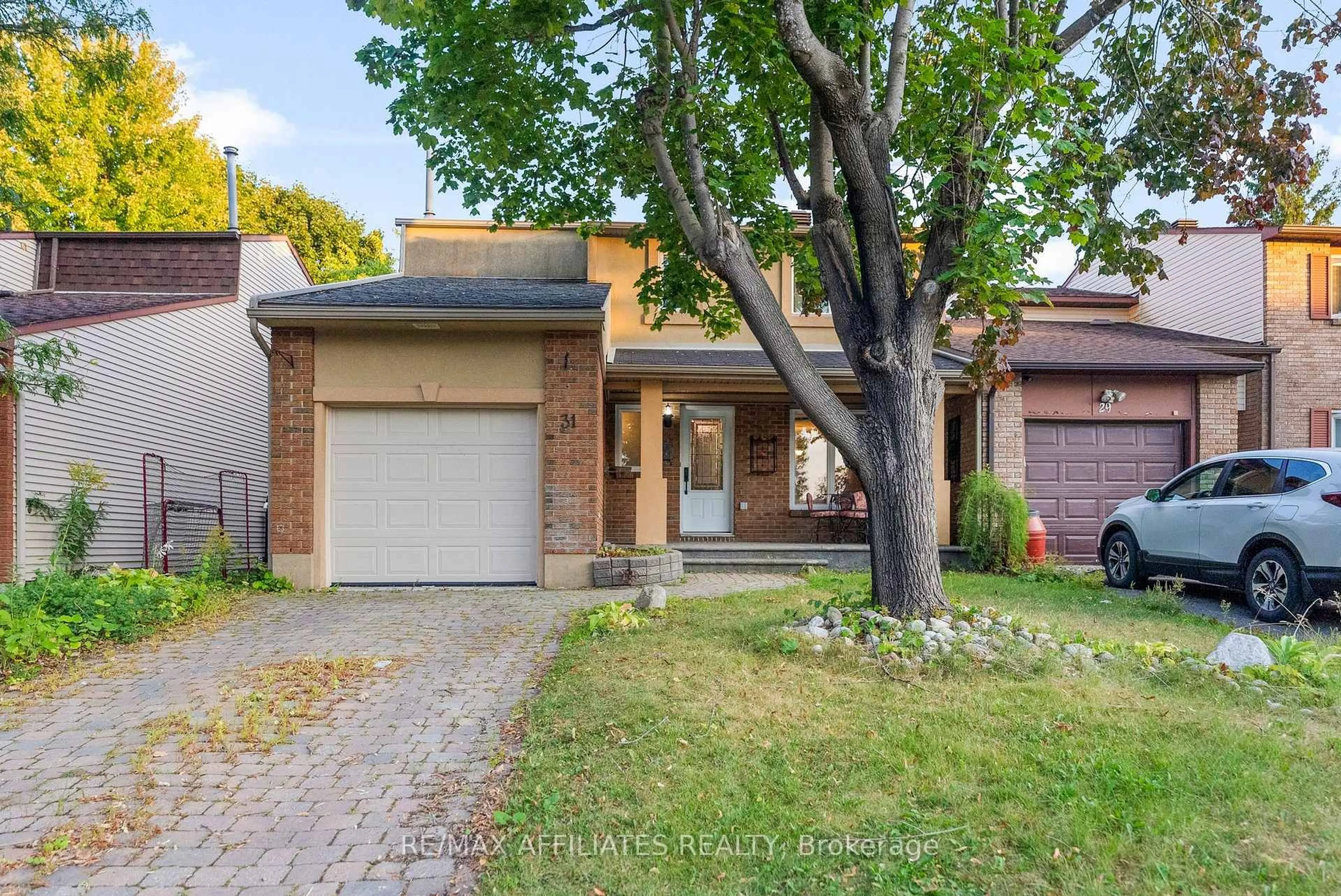 Home with brick exterior material, street for 31 Exeter Dr, Ottawa Ontario K2J 1Z9