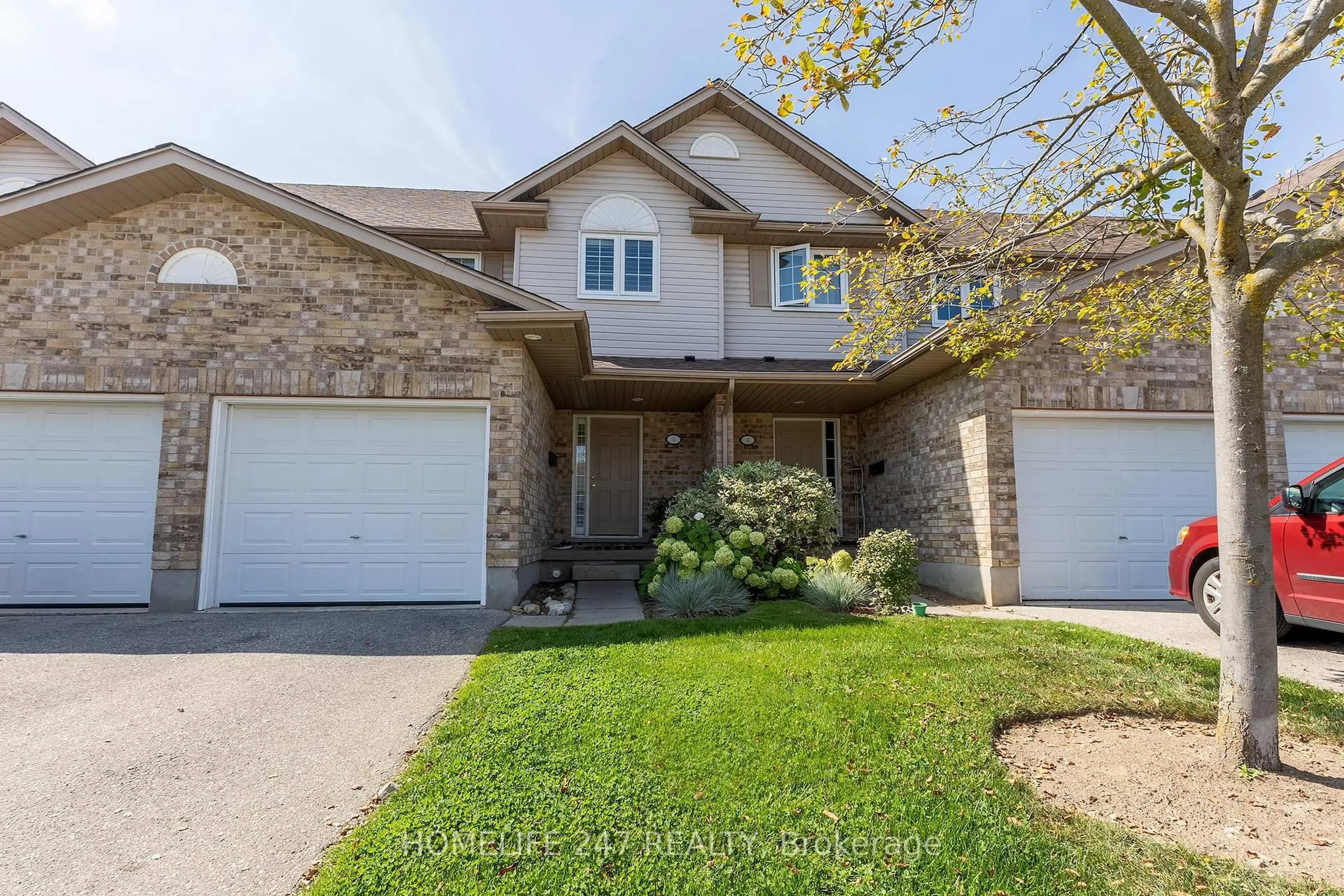 Home with brick exterior material, street for 31 Schroder Cres #5, Guelph Ontario N1E 7M6