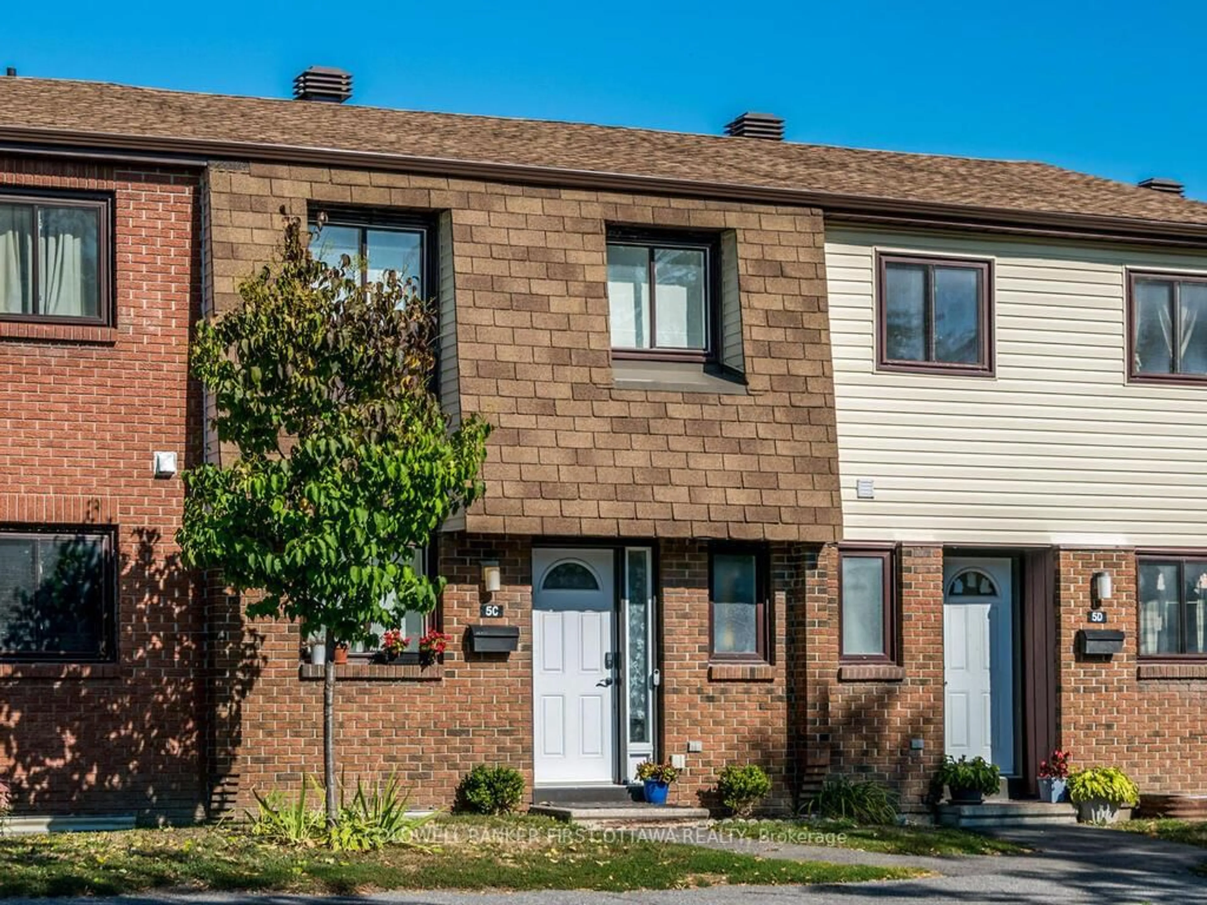 Home with brick exterior material, street for 5C Woodvale Green, Ottawa Ontario K2G 4G9