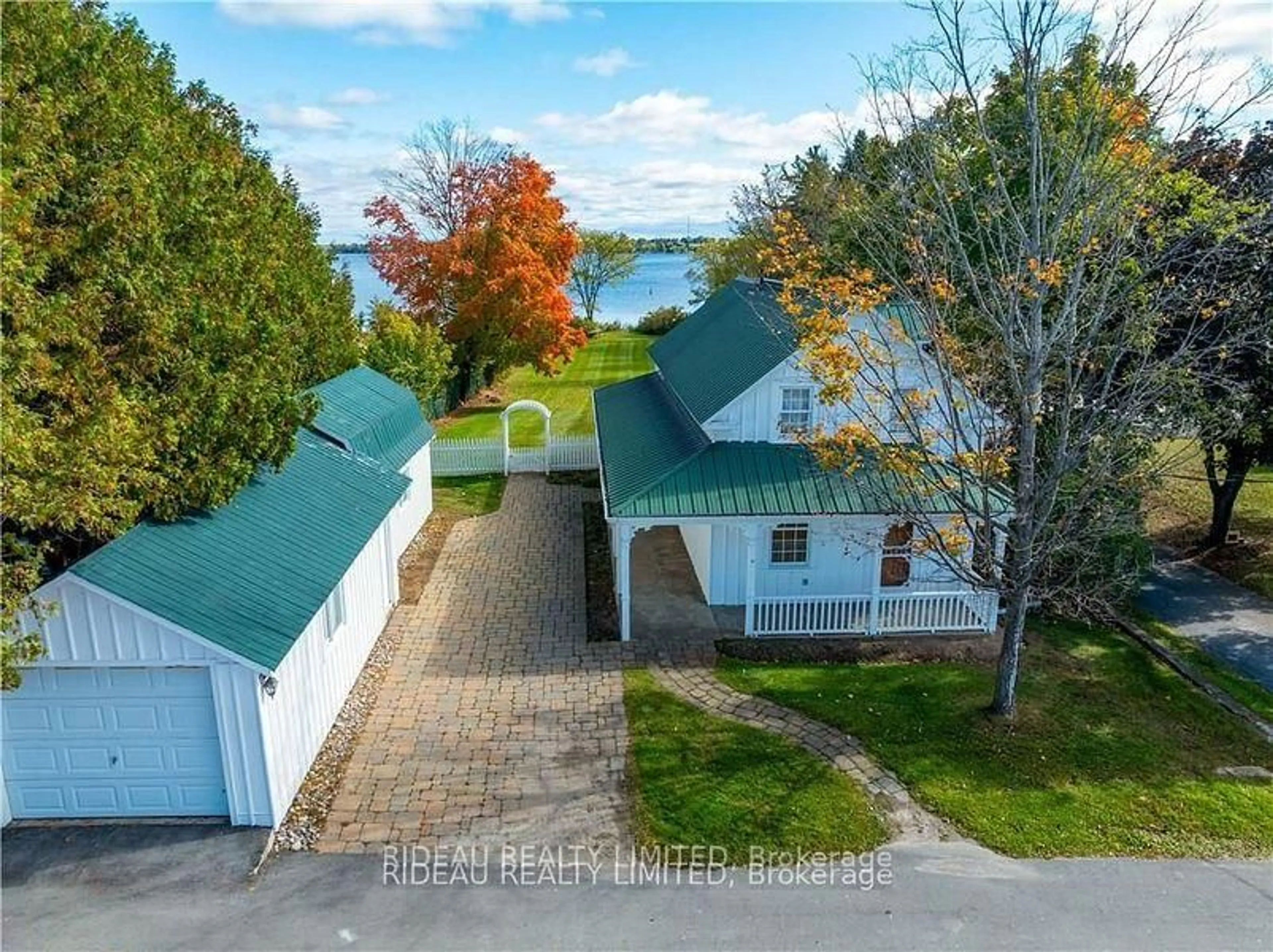 A pic from outside/outdoor area/front of a property/back of a property/a pic from drone, water/lake/river/ocean view for 17 MAIN ST E St, Westport Ontario K0G 1X0