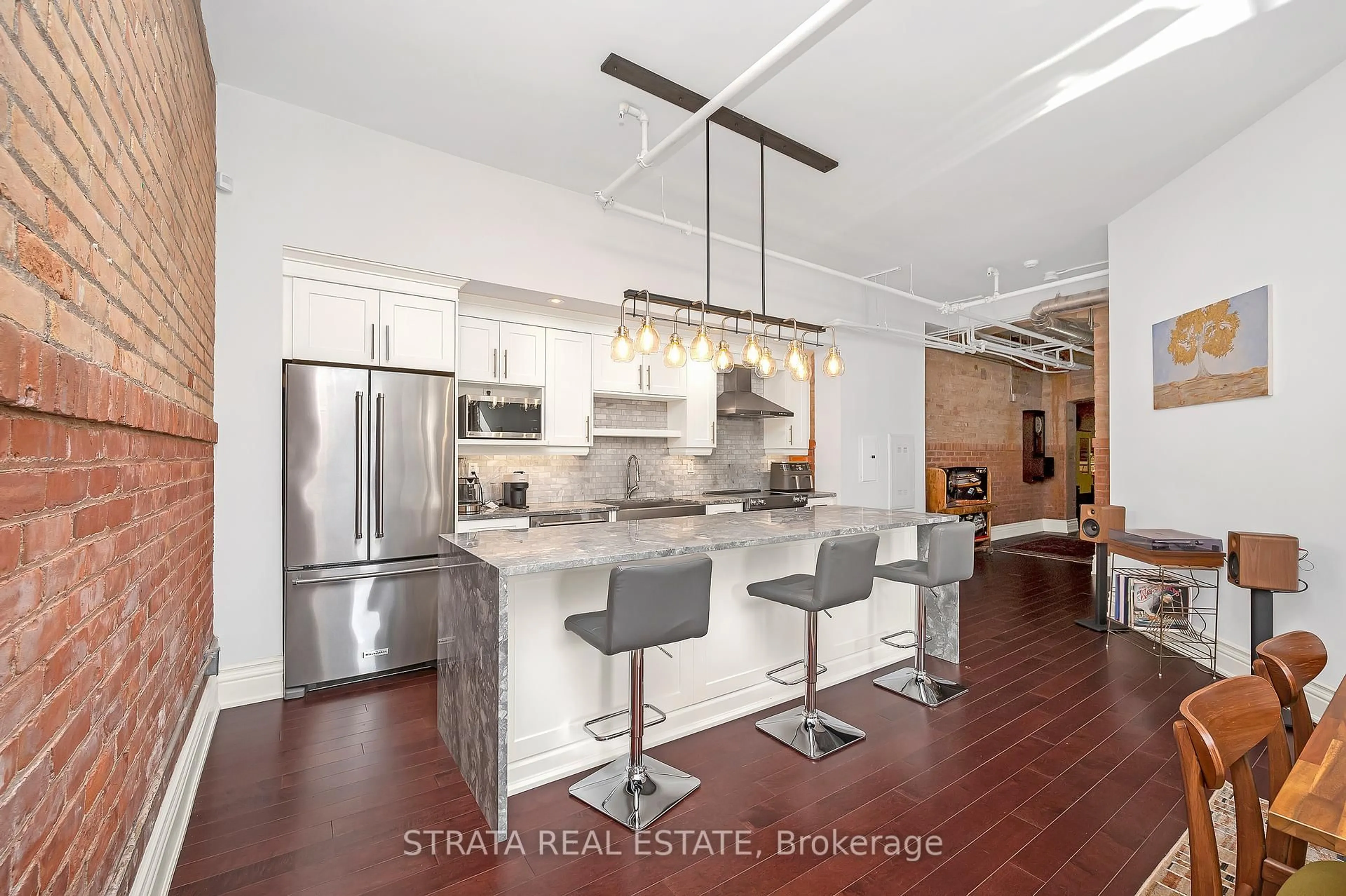 Open concept kitchen, ceramic/tile floor for 200 Stinson St #107, Hamilton Ontario L8N 4J5