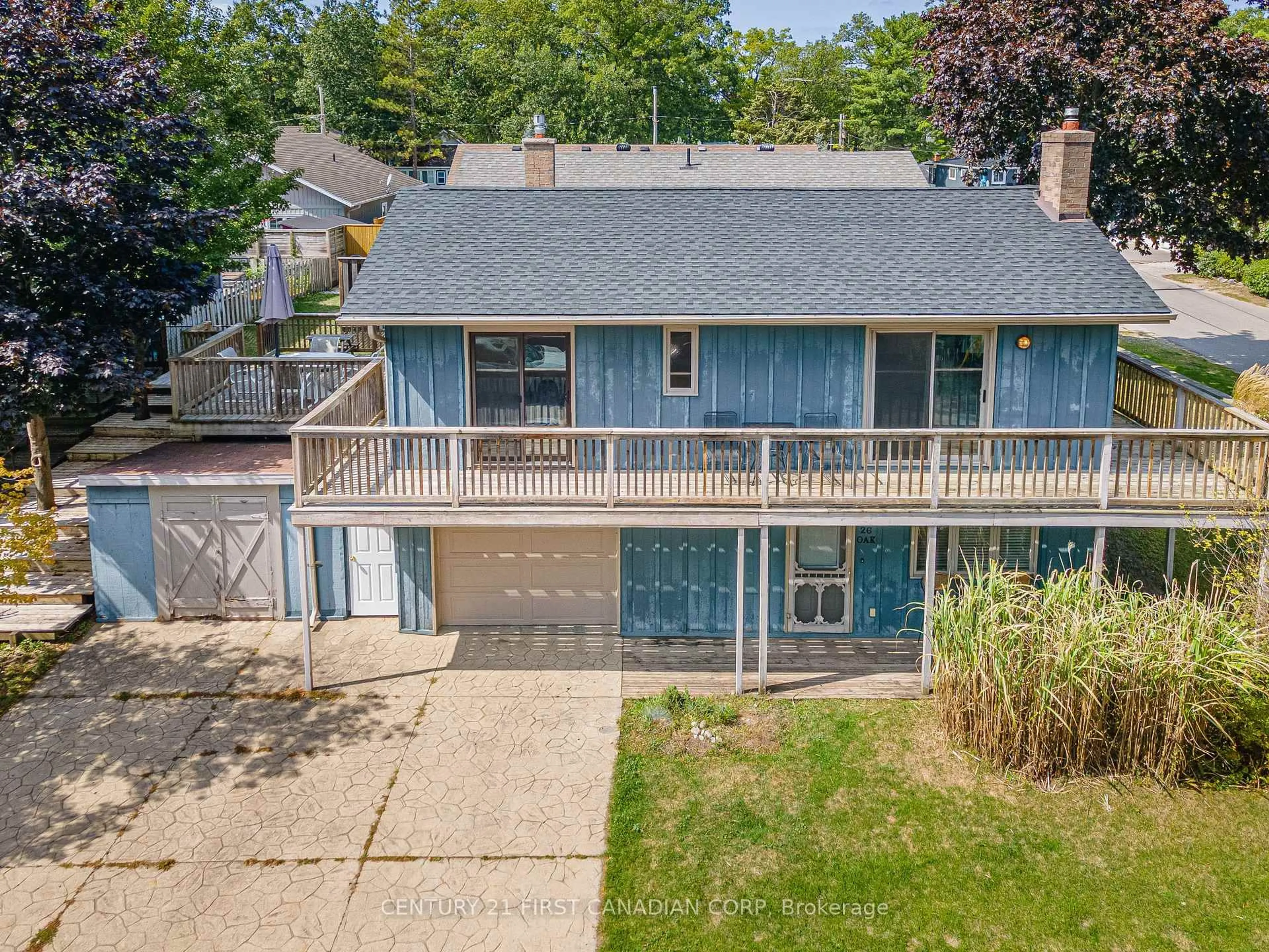 A pic from outside/outdoor area/front of a property/back of a property/a pic from drone, street for 26 Oak St, Lambton Shores Ontario N0M 1T0