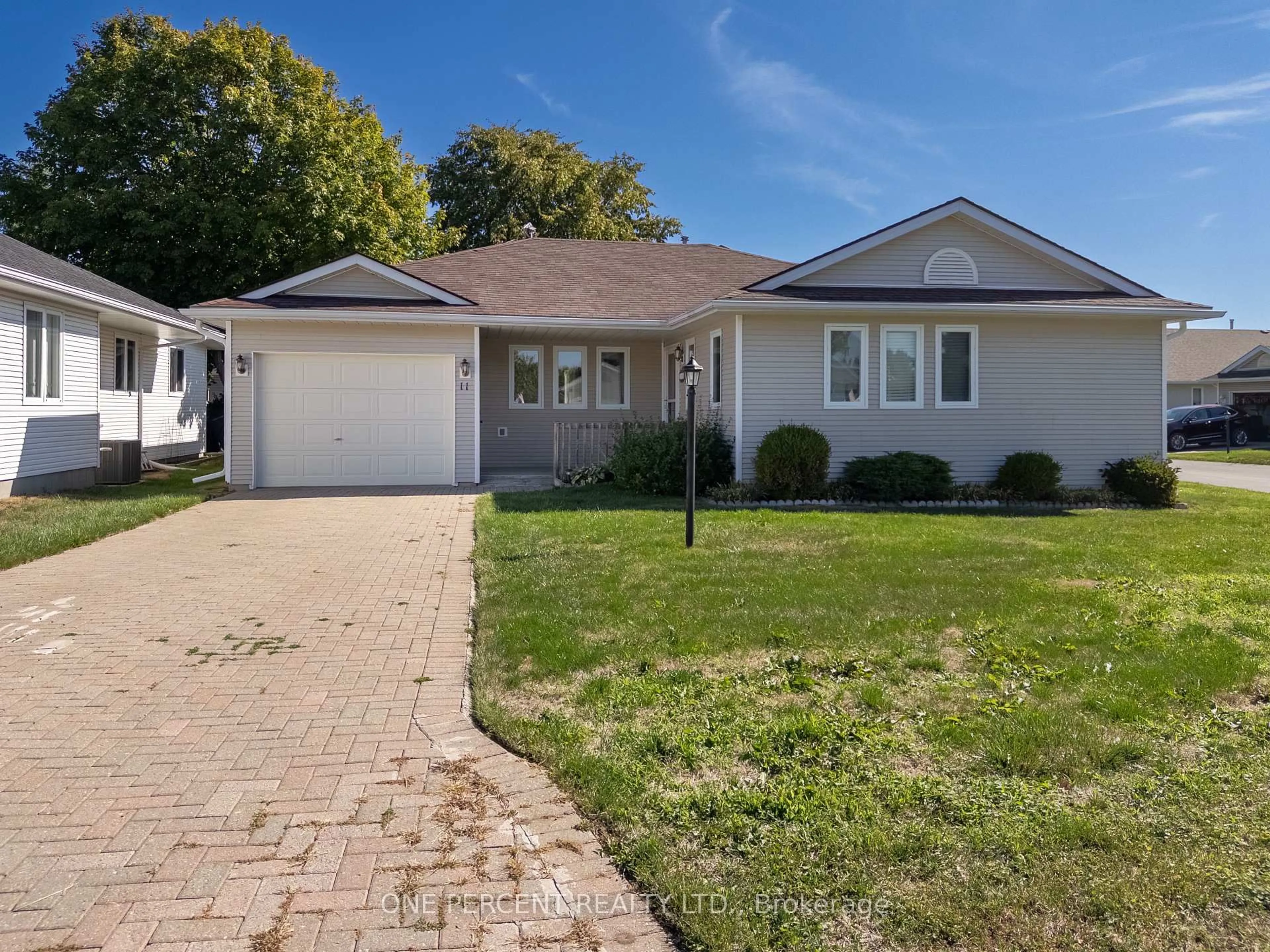 Home with vinyl exterior material, street for 11 Monroe Crt, Prince Edward County Ontario K0K 3L0