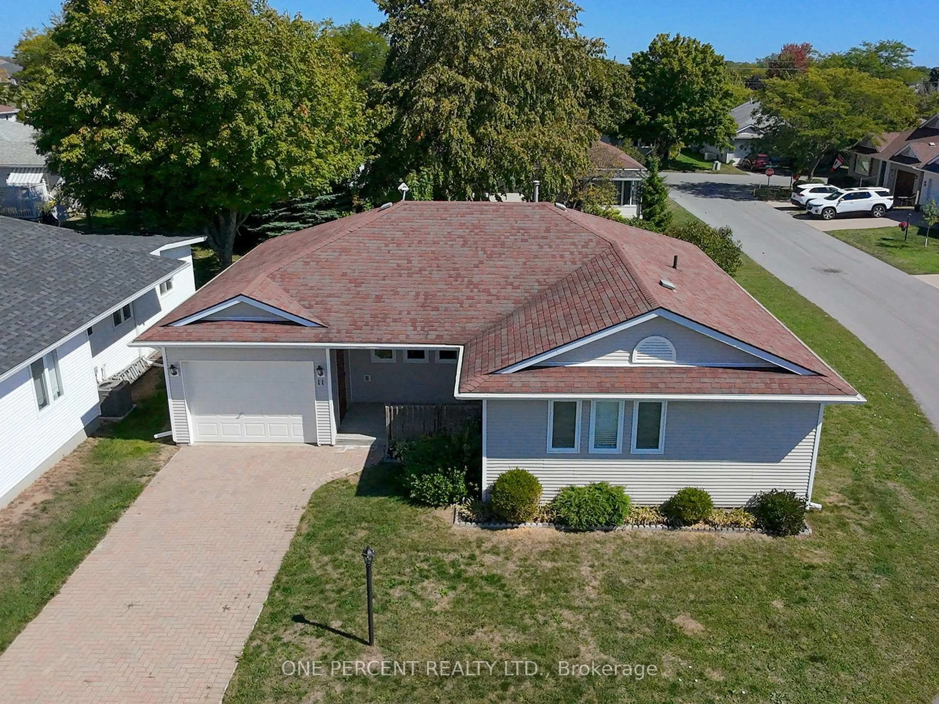 A pic from outside/outdoor area/front of a property/back of a property/a pic from drone, street for 11 Monroe Crt, Prince Edward County Ontario K0K 3L0