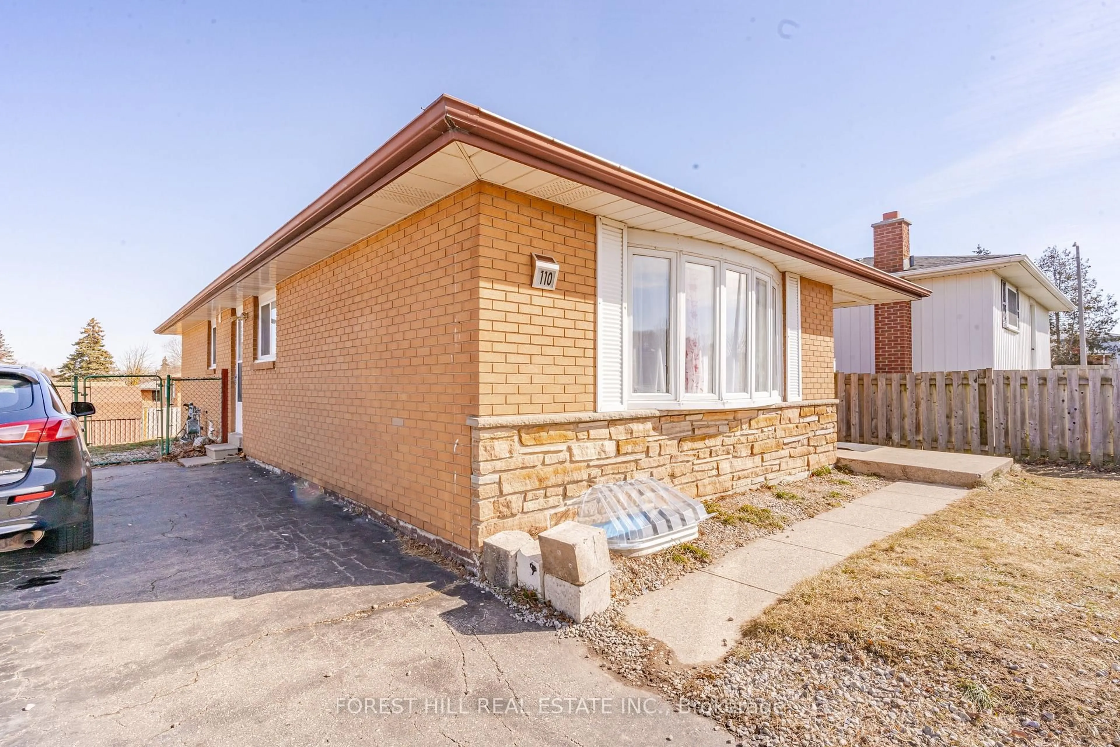 Home with brick exterior material, street for 110 Hazelglen Dr, Kitchener Ontario N2M 2E5