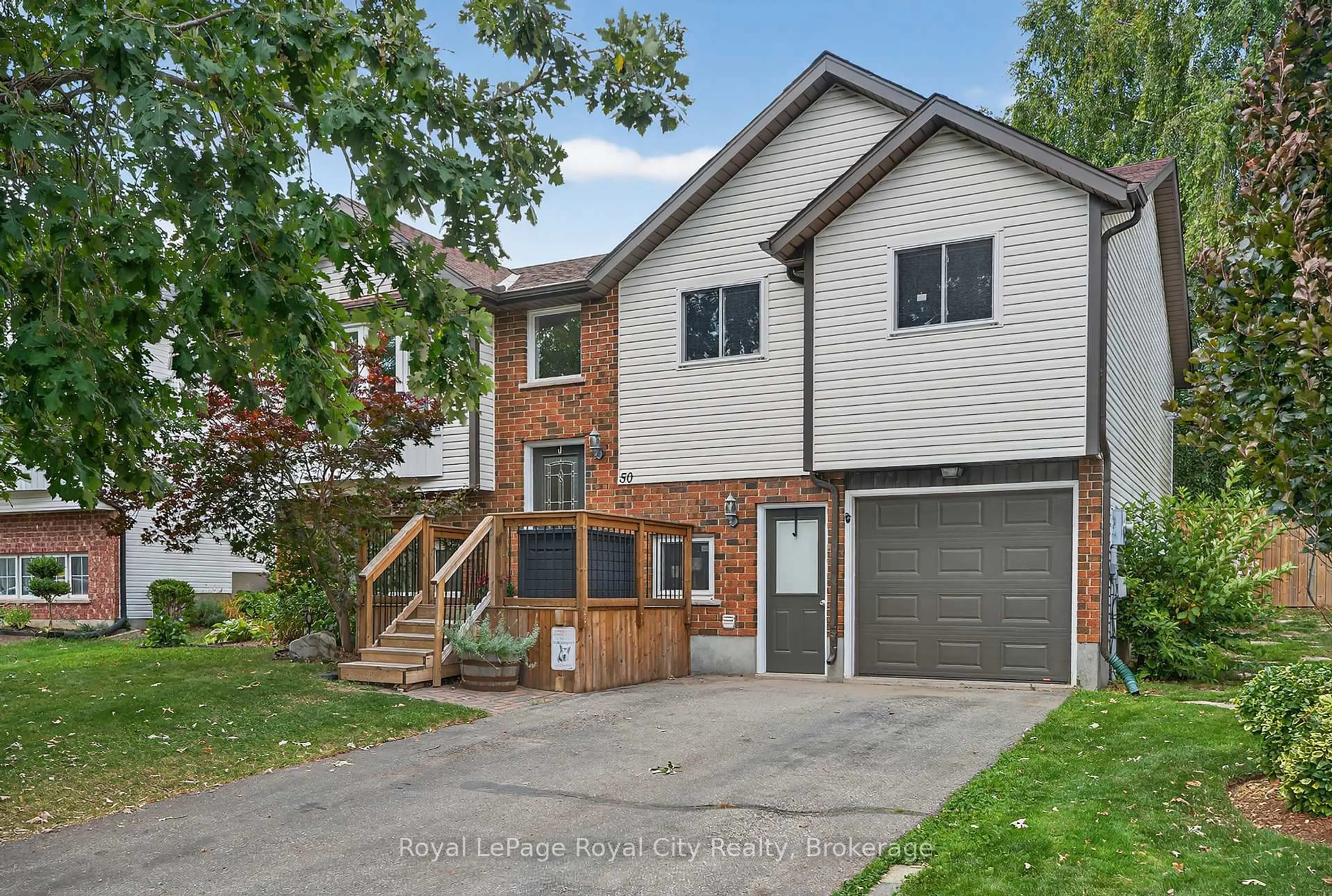 Home with brick exterior material, street for 50 Mclachlan Pl, Guelph Ontario N1H 8K4
