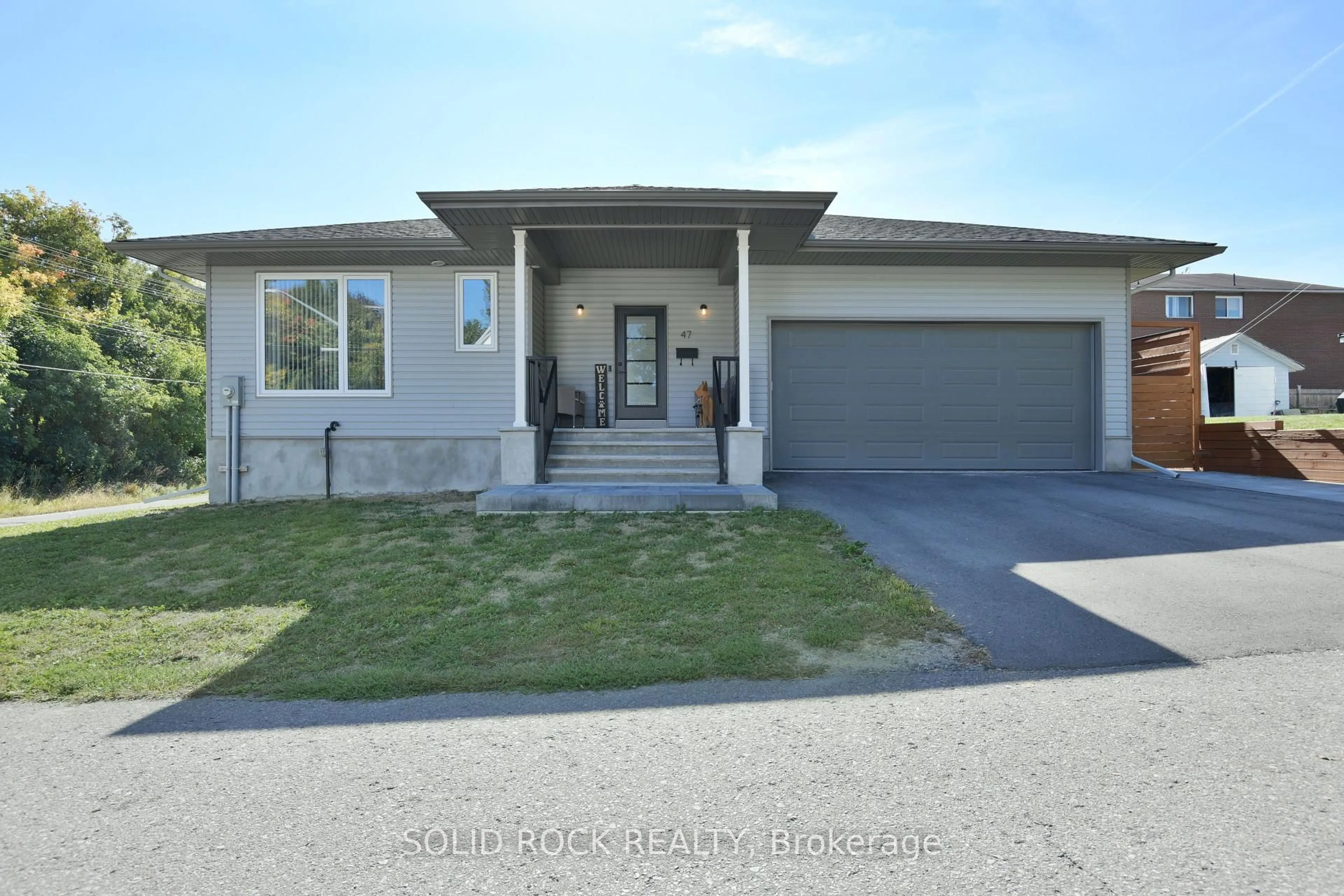 Home with vinyl exterior material, street for 47 Mill Lane, Arnprior Ontario K7S 1L1