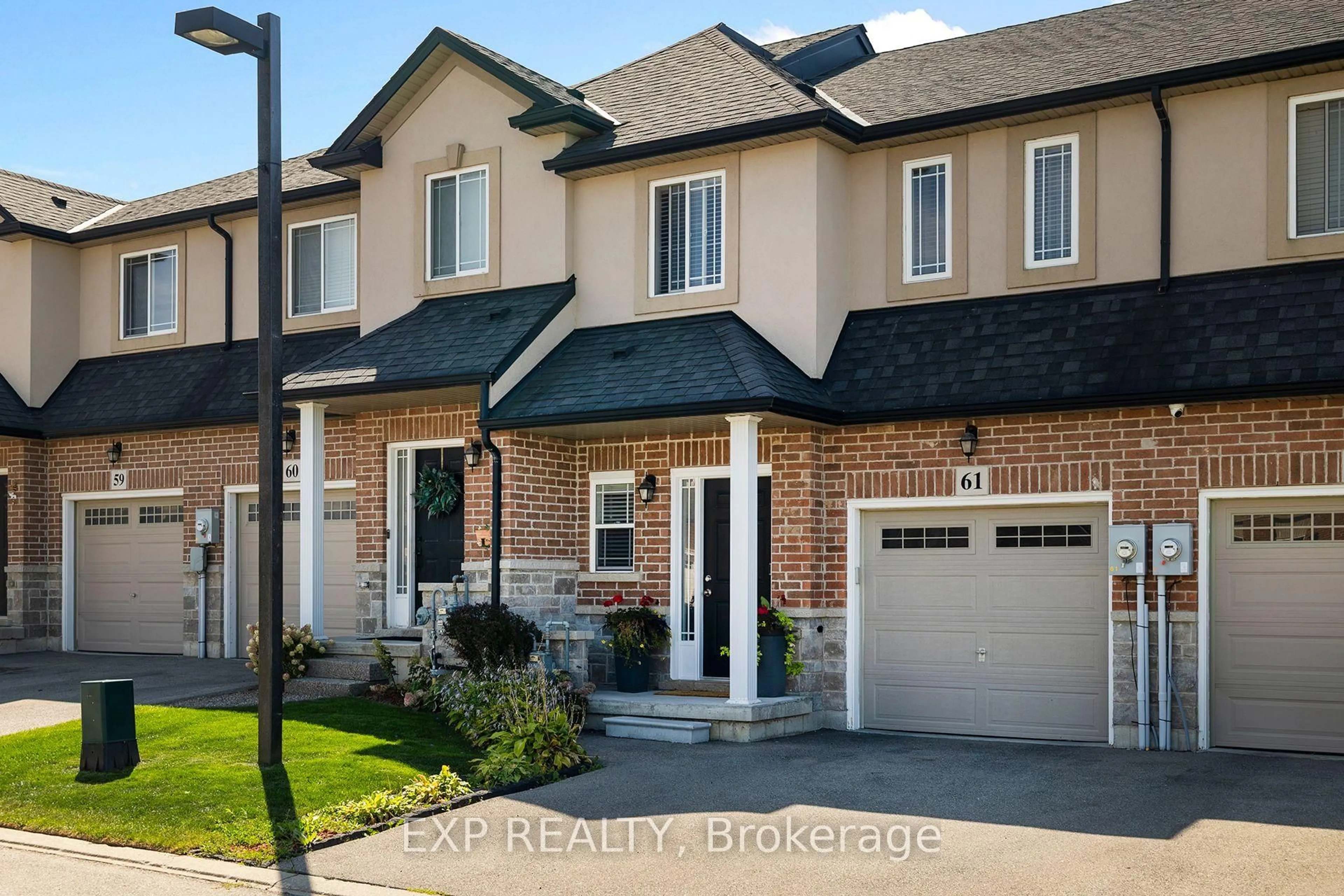 Home with brick exterior material, street for 9 Hampton Brook Way #61, Hamilton Ontario L0R 1W0