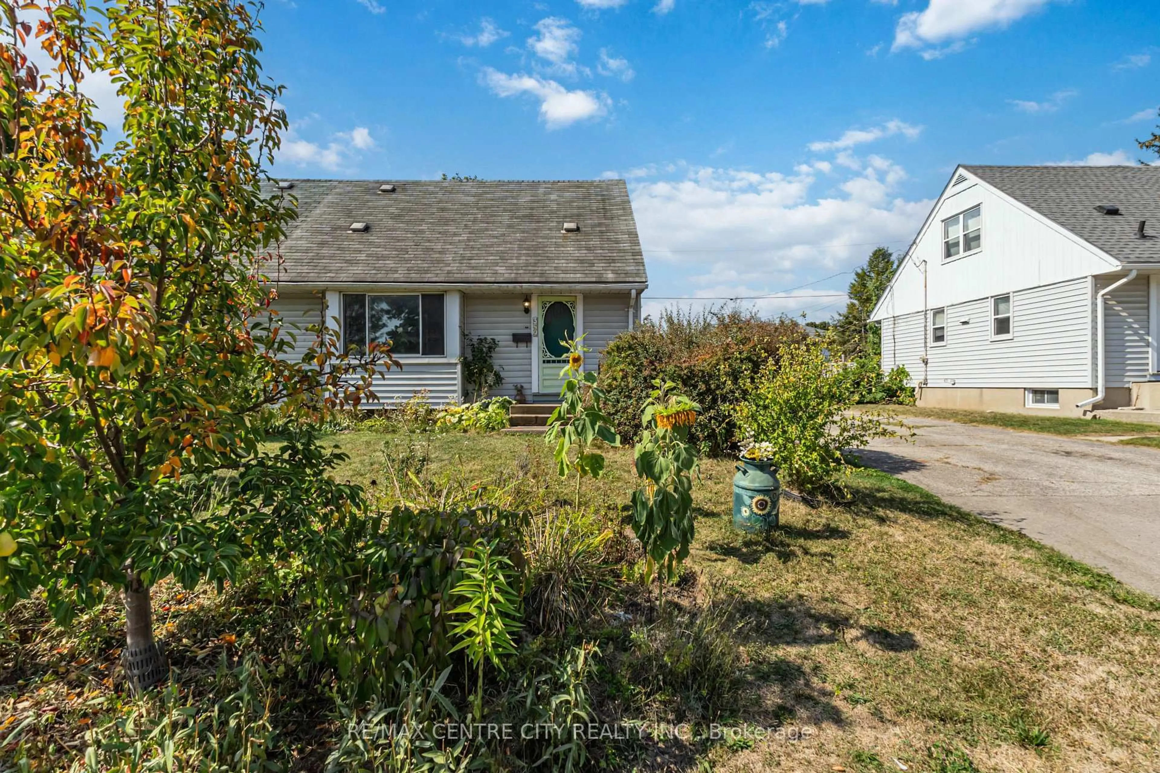 A pic from outside/outdoor area/front of a property/back of a property/a pic from drone, street for 359 Flanders Row, London East Ontario N5Y 1C3