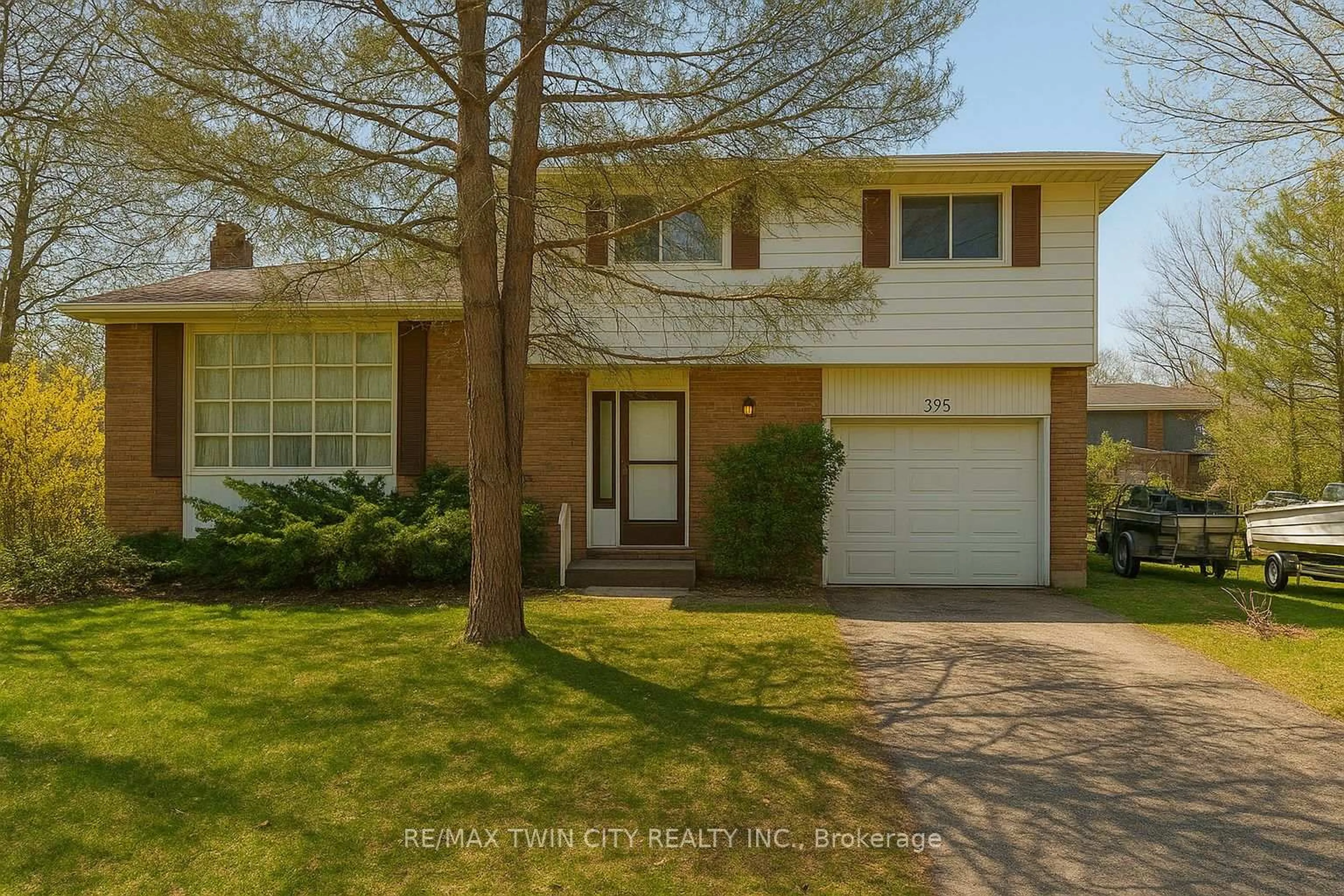 Home with brick exterior material, street for 395 Mossom Pl, Waterloo Ontario N2K 2G7