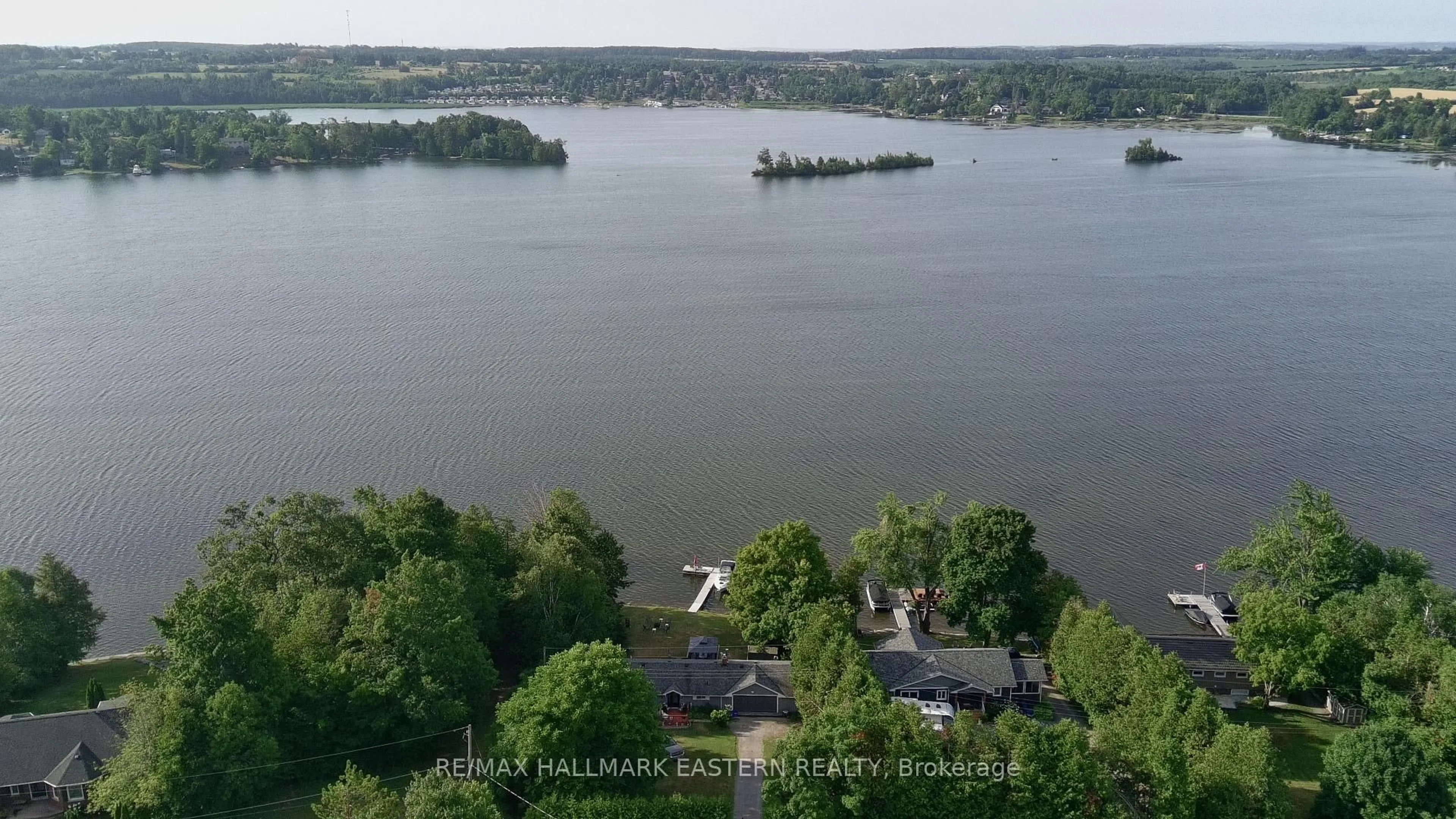 A pic from outside/outdoor area/front of a property/back of a property/a pic from drone, water/lake/river/ocean view for 51 Darling Dr, Selwyn Ontario K0L 2W0