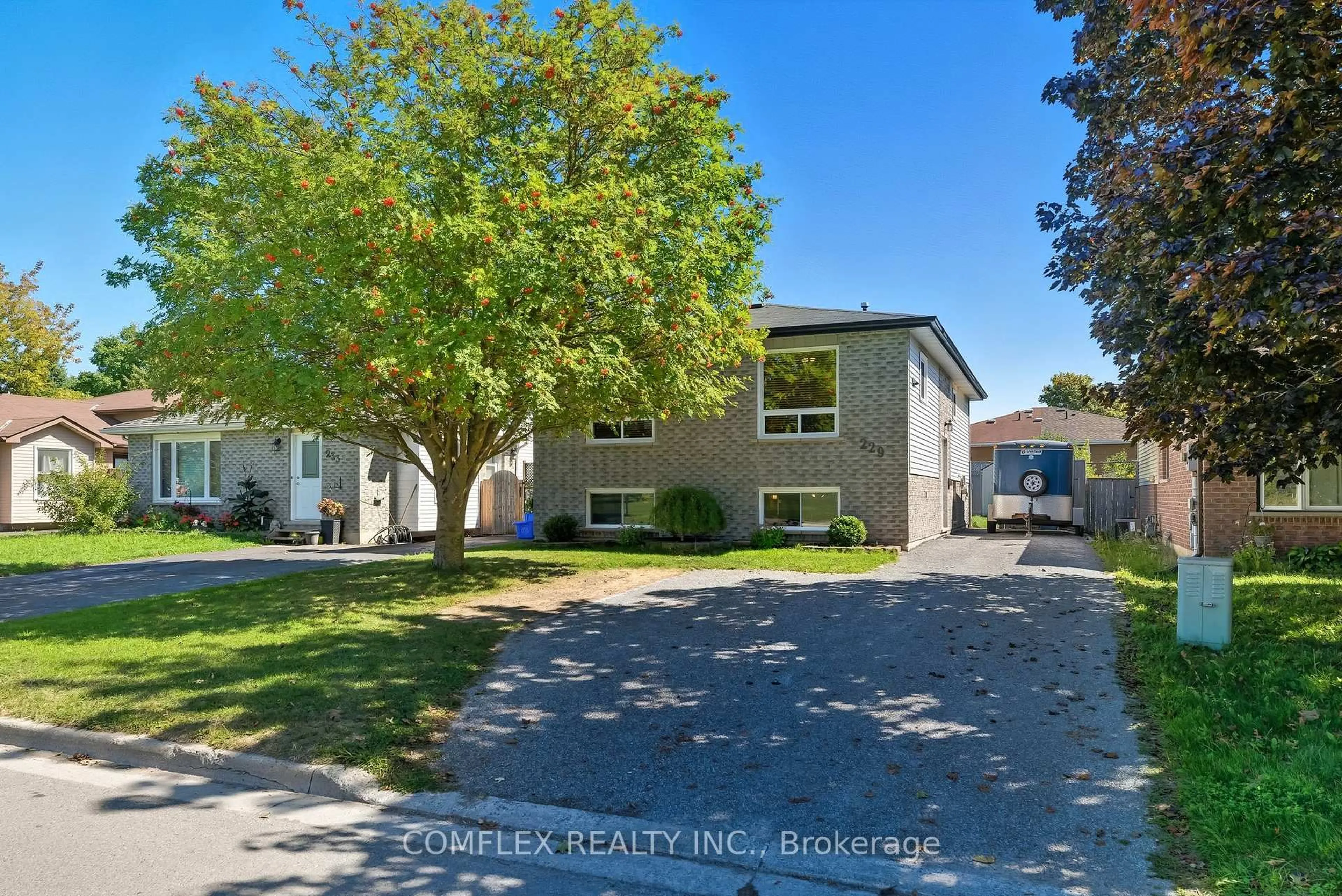 A pic from outside/outdoor area/front of a property/back of a property/a pic from drone, street for 229 MIDDLEFIELD Rd, Peterborough Ontario K9J 8H4