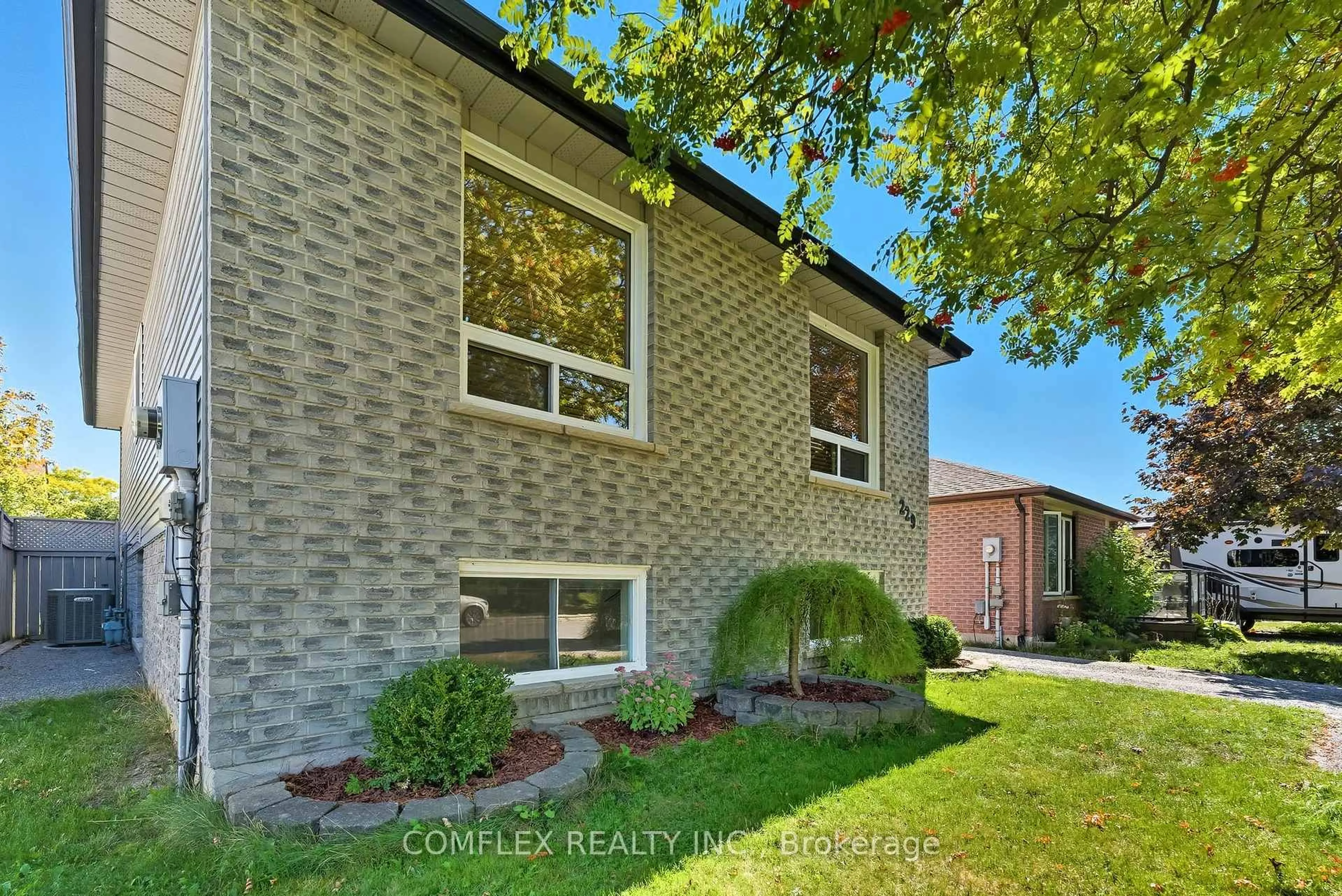 Home with brick exterior material, street for 229 MIDDLEFIELD Rd, Peterborough Ontario K9J 8H4