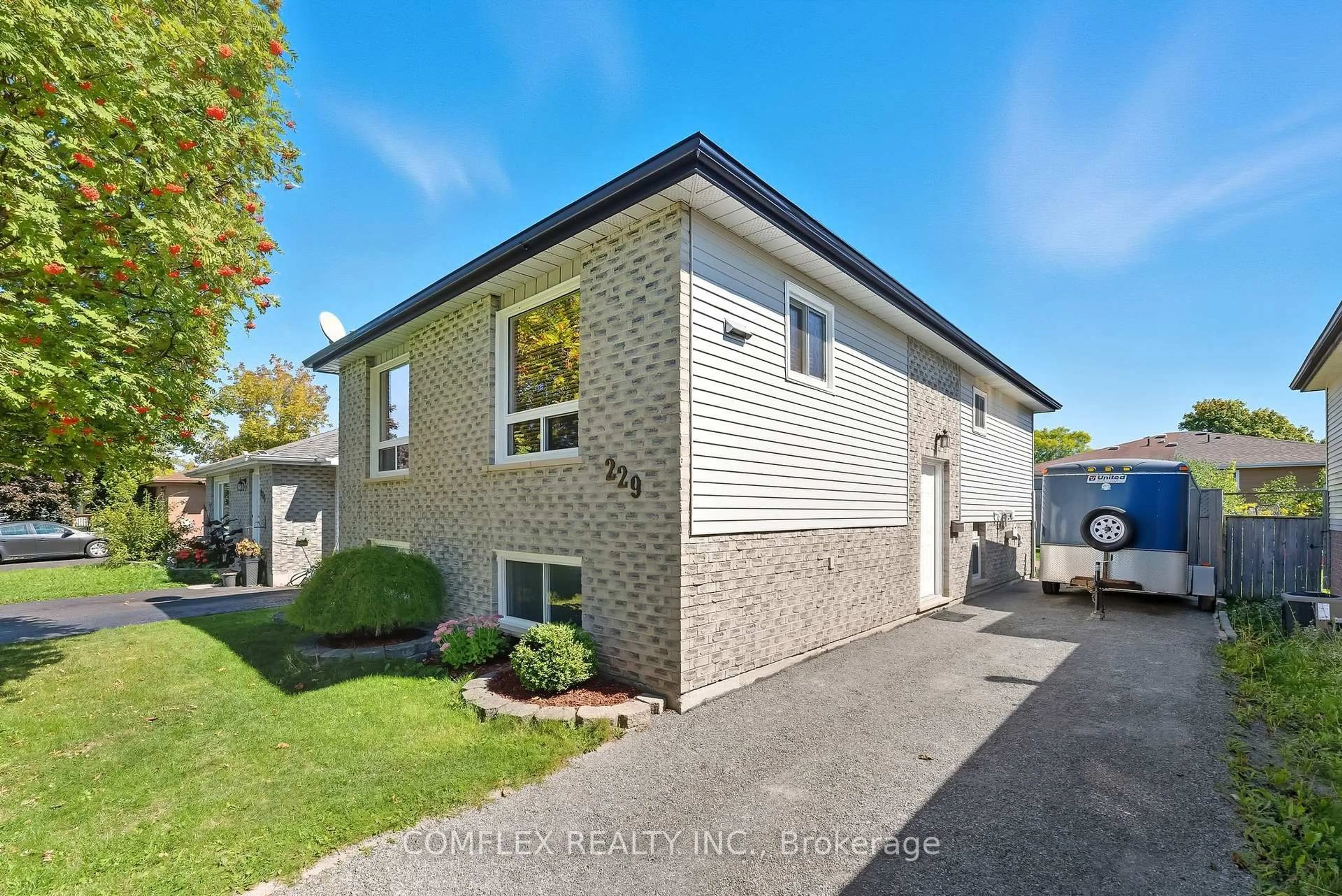 Home with brick exterior material, street for 229 MIDDLEFIELD Rd, Peterborough Ontario K9J 8H4