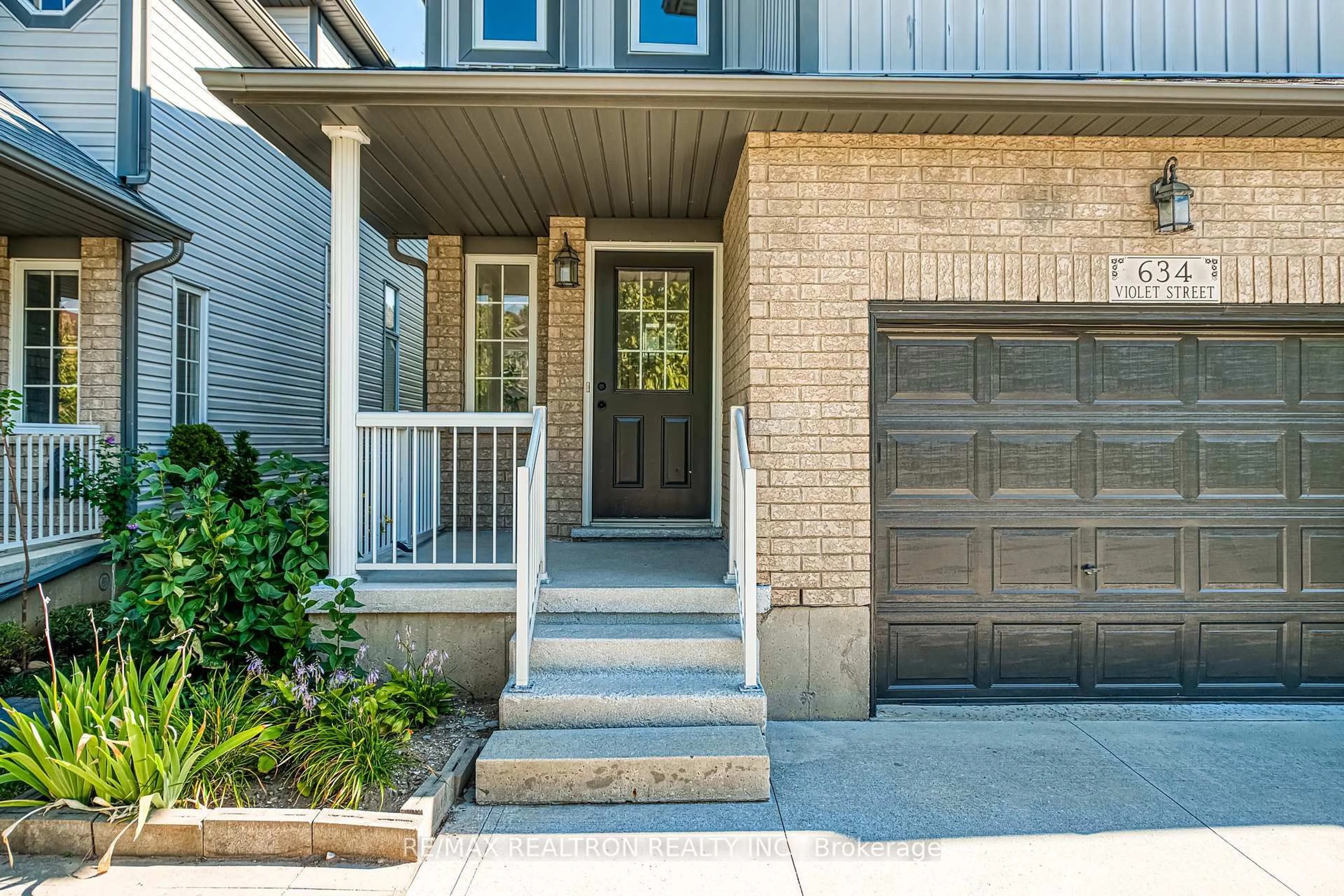 Home with brick exterior material, street for 634 Violet St, Waterloo Ontario N2V 2V9