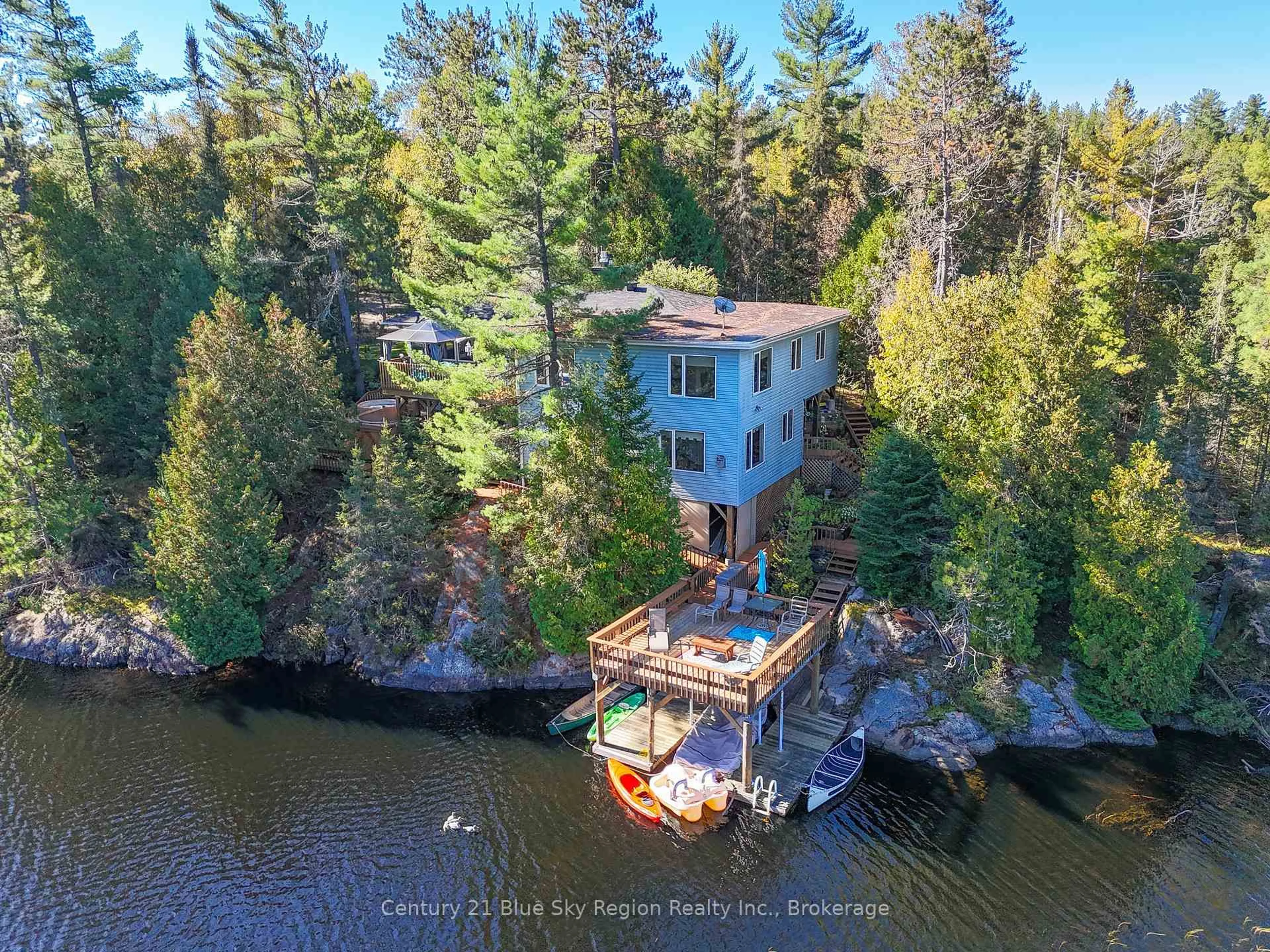 A pic from outside/outdoor area/front of a property/back of a property/a pic from drone, water/lake/river/ocean view for 5065 Highway 11, Temagami Ontario P0H 1H0