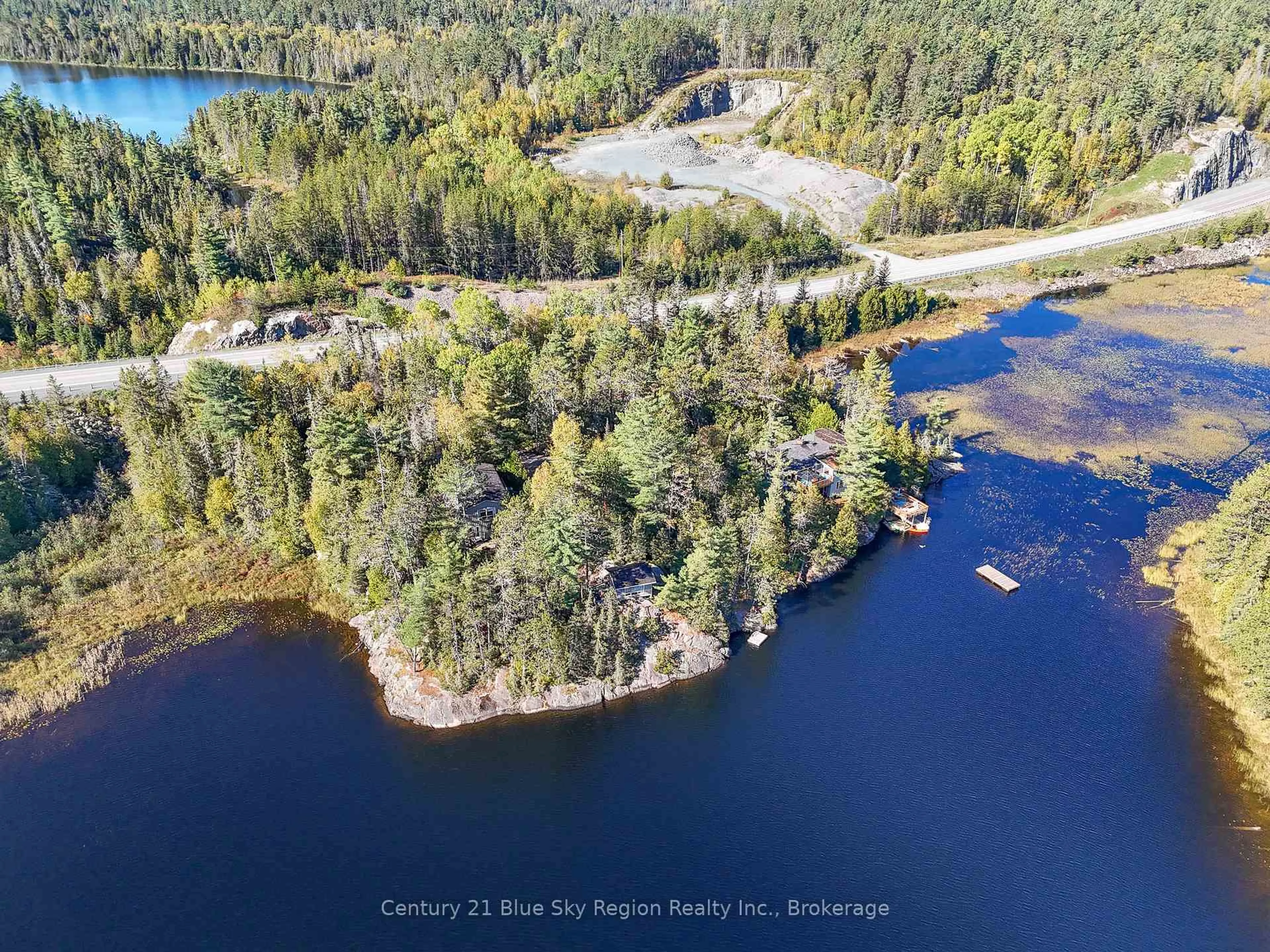 A pic from outside/outdoor area/front of a property/back of a property/a pic from drone, water/lake/river/ocean view for 5065 Highway 11, Temagami Ontario P0H 1H0