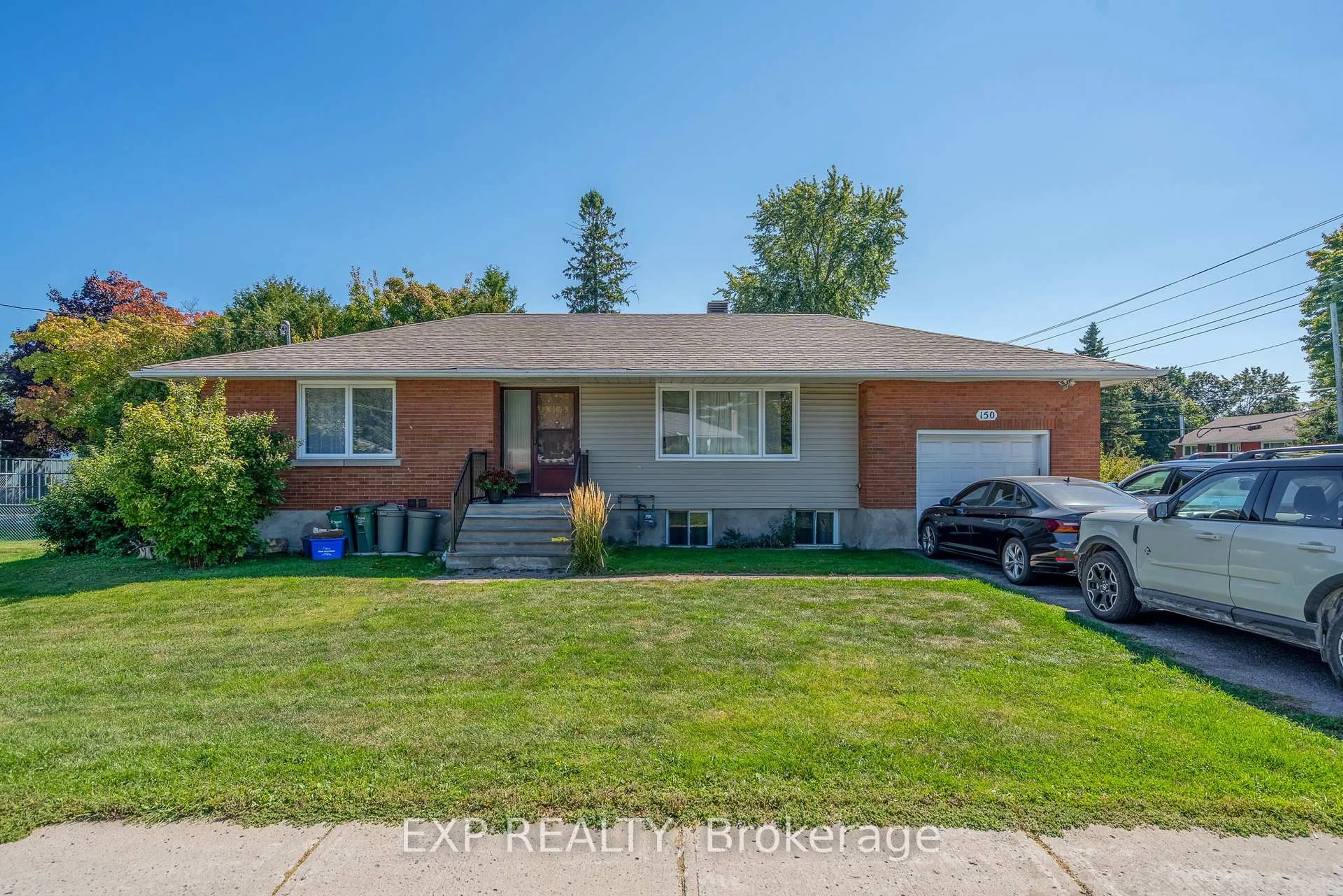 Home with brick exterior material, street for 150 Meadowlands Dr, Ottawa Ontario K2G 2S5