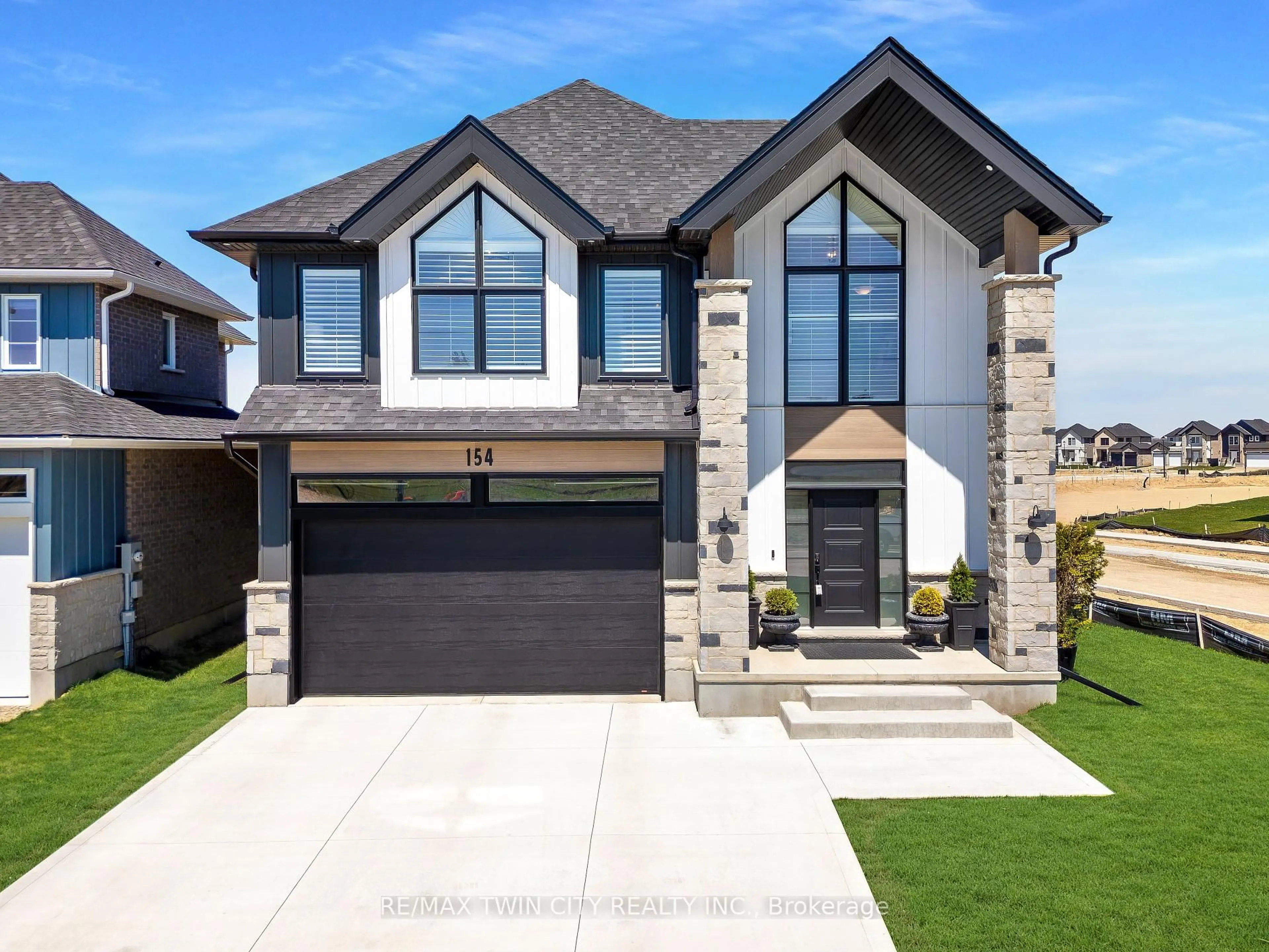 Home with brick exterior material, street for 154 Dempsey Dr, Stratford Ontario N5A 0R5