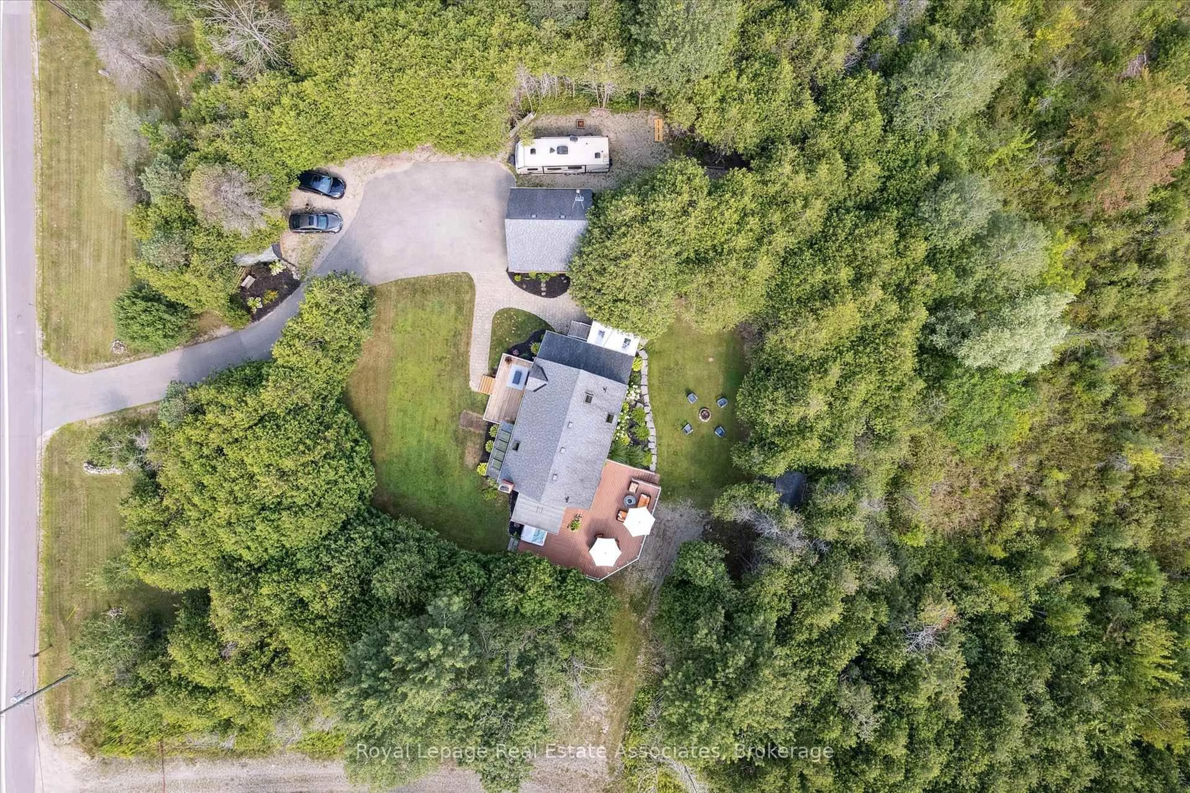 A pic from outside/outdoor area/front of a property/back of a property/a pic from drone, forest/trees view for 23 Brock Rd, Puslinch Ontario N0B 2J0