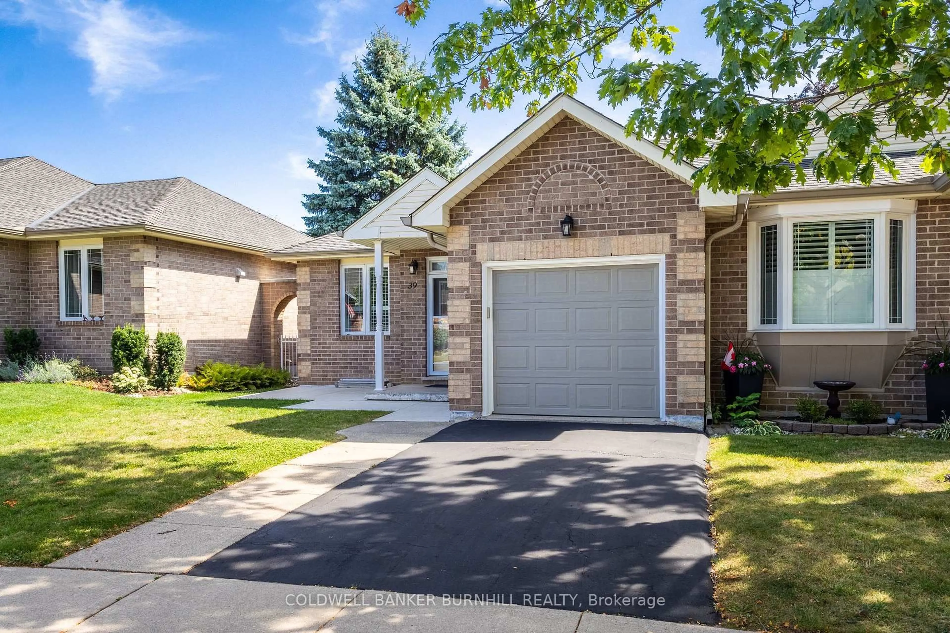 Home with brick exterior material, street for 39 Twenty Place Blvd, Hamilton Ontario L0R 1W0
