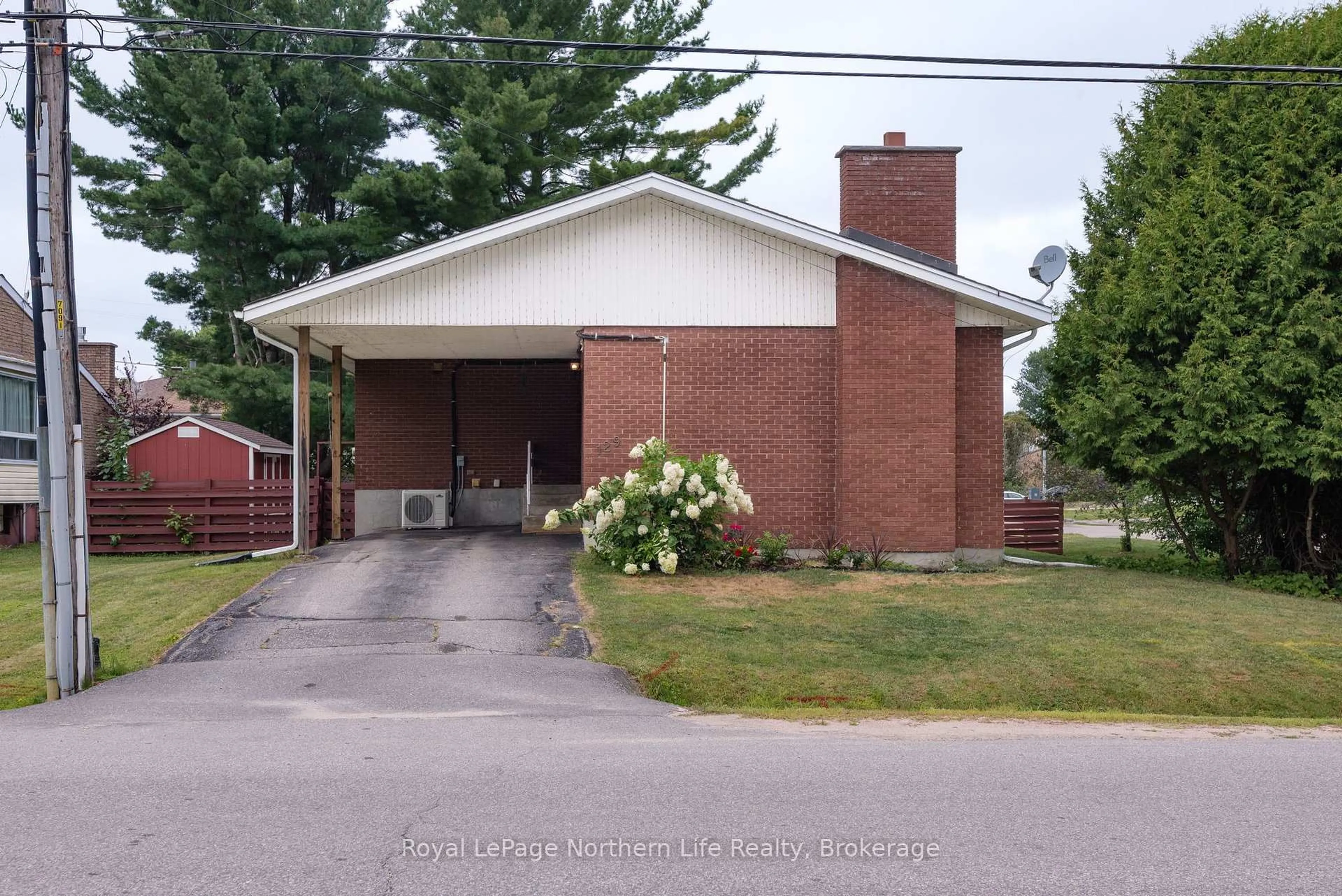Home with brick exterior material, street for 129 Marshall Park Dr, North Bay Ontario P1A 3L1