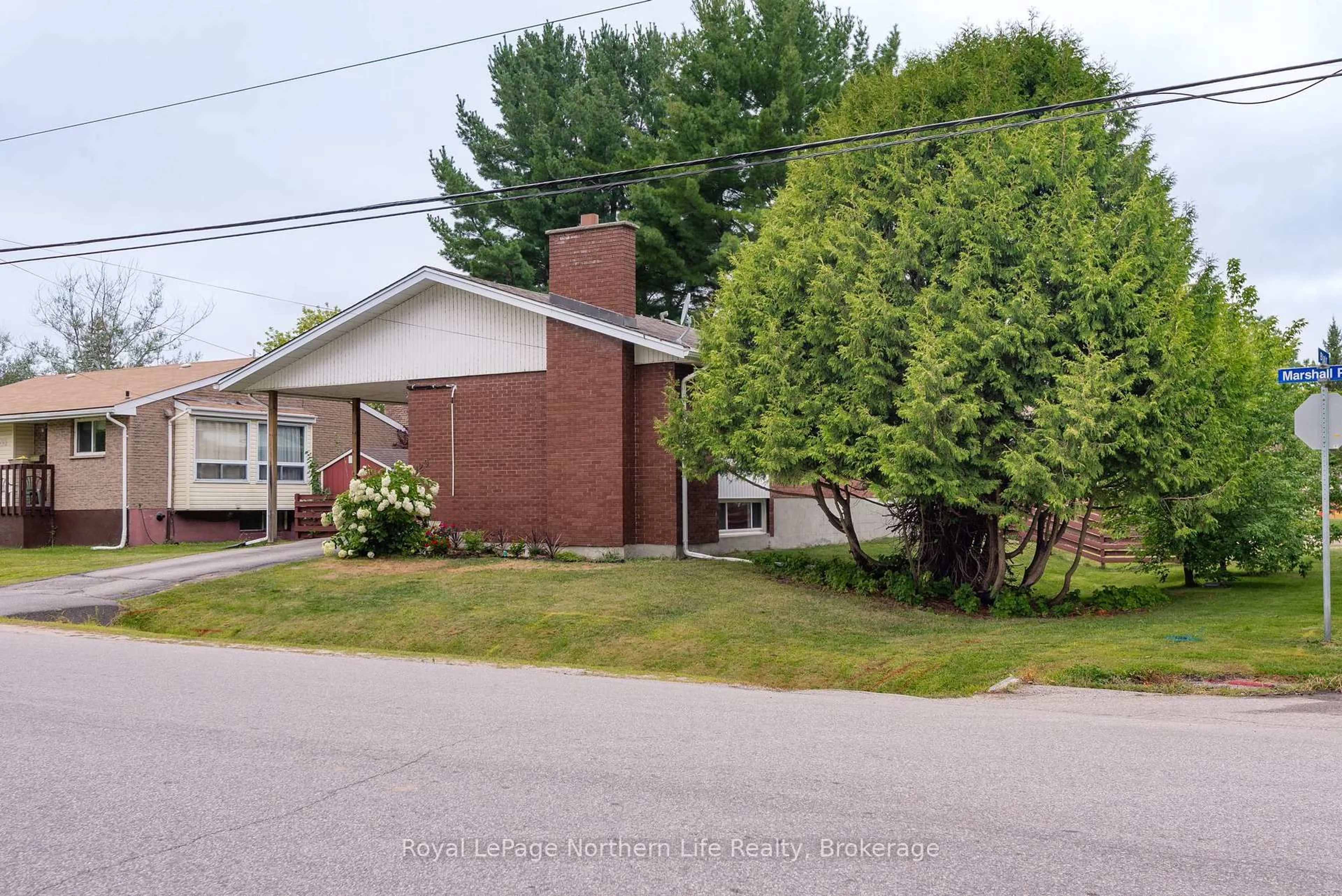 Home with brick exterior material, street for 129 Marshall Park Dr, North Bay Ontario P1A 3L1