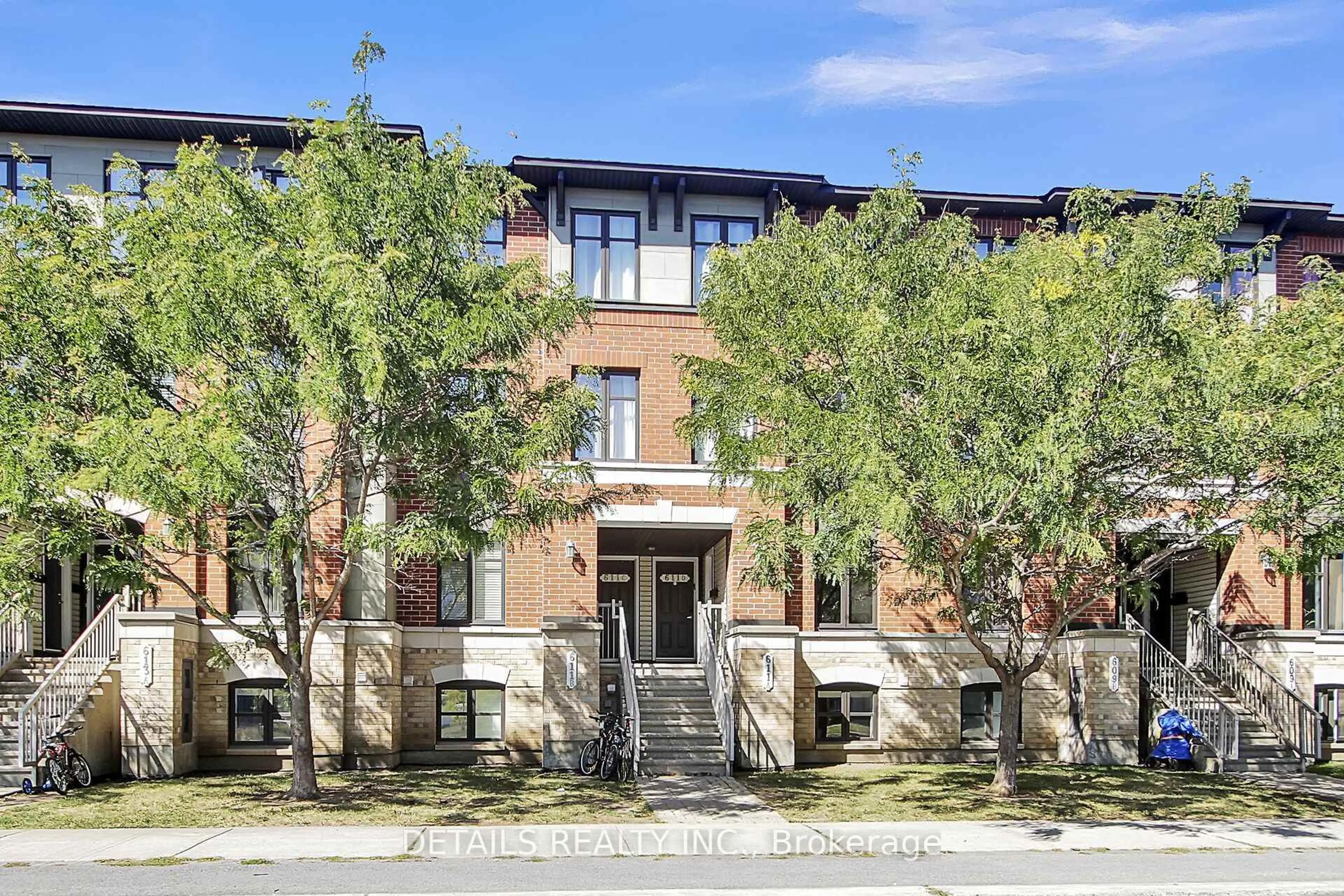 Home with brick exterior material, building for 611 Chapman Mills Dr #A, Ottawa Ontario K2J 5T1