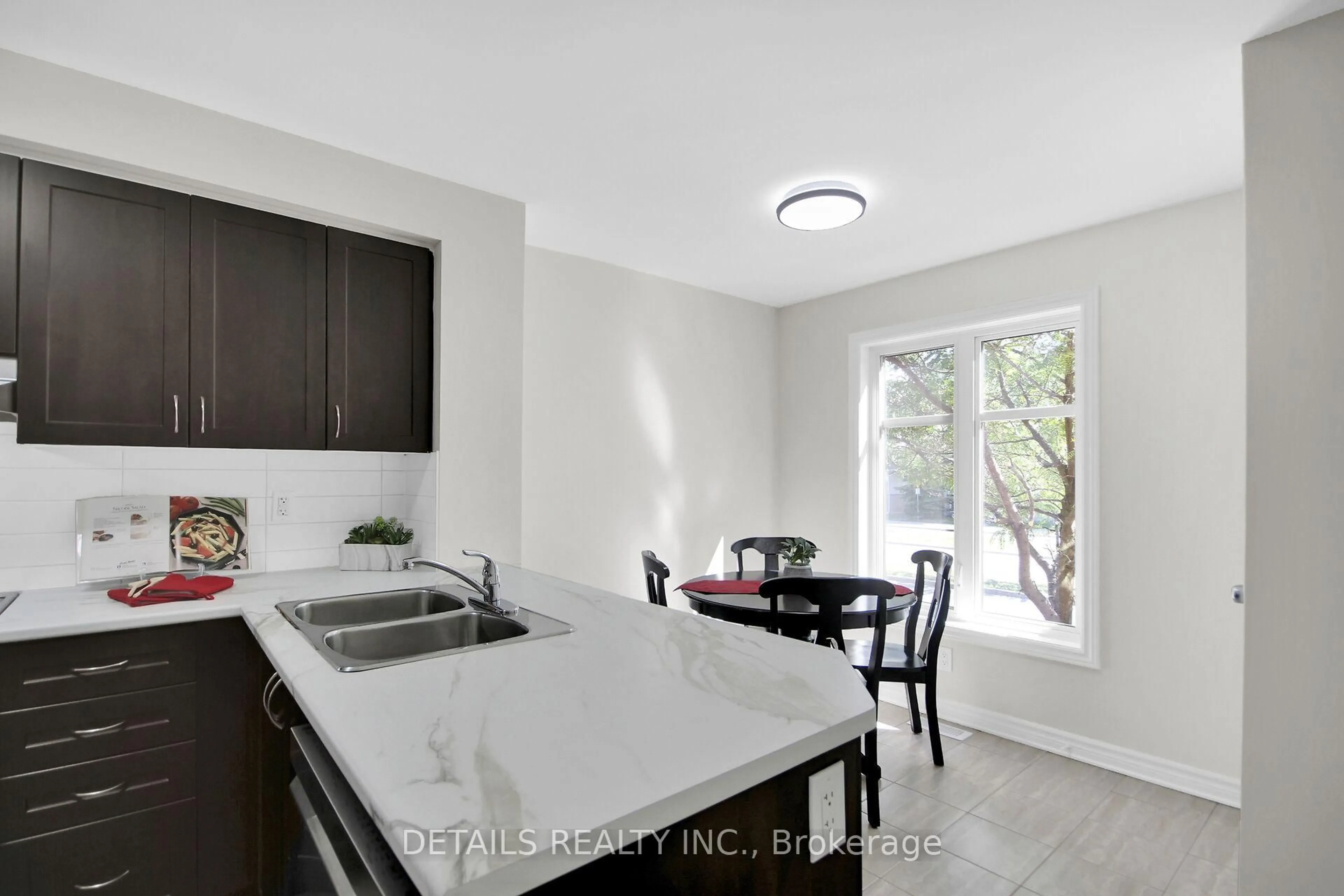 Open concept kitchen, ceramic/tile floor for 611 Chapman Mills Dr #A, Ottawa Ontario K2J 5T1