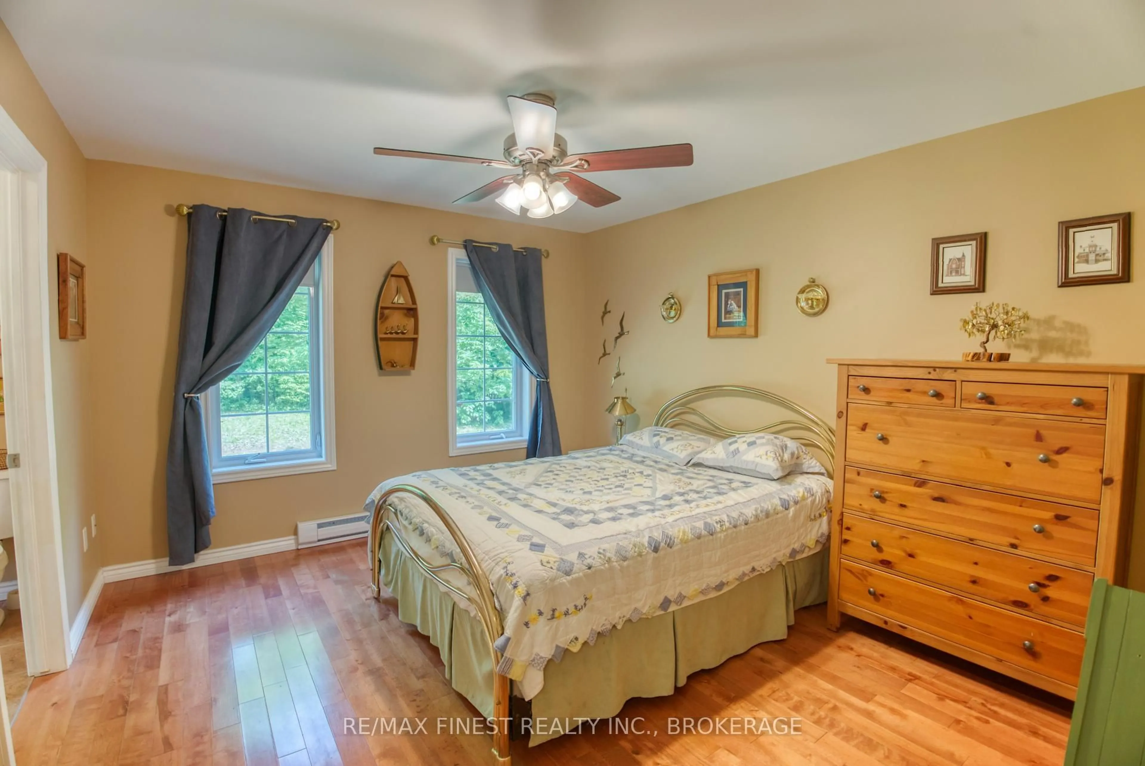 Bedroom with bed, wood/laminate floor for 855A Crow Lake Rd, Maberly Ontario K0H 2B0
