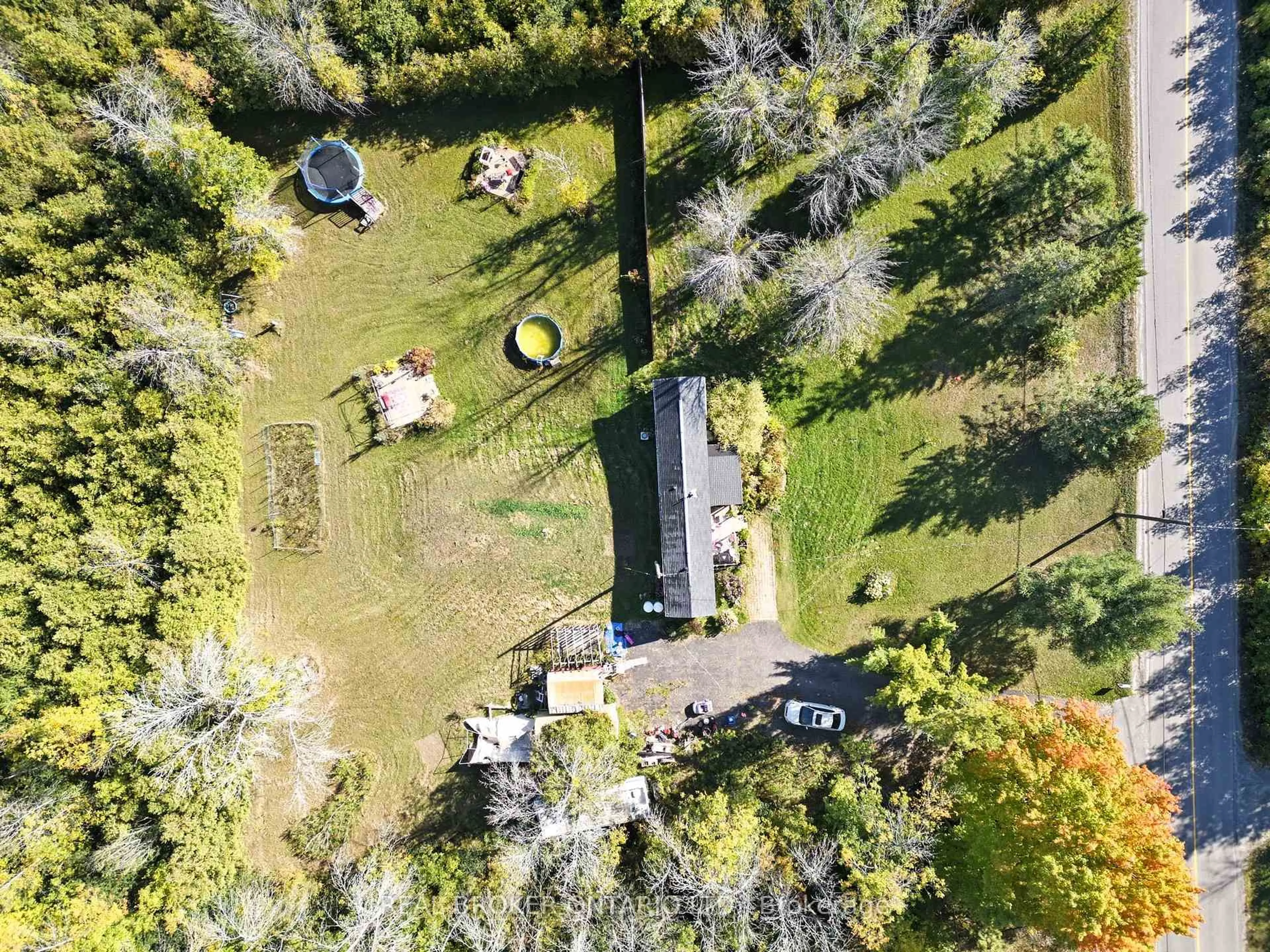 A pic from outside/outdoor area/front of a property/back of a property/a pic from drone, forest/trees view for 1011 Whitney Rd, North Grenville Ontario K0G 1J0