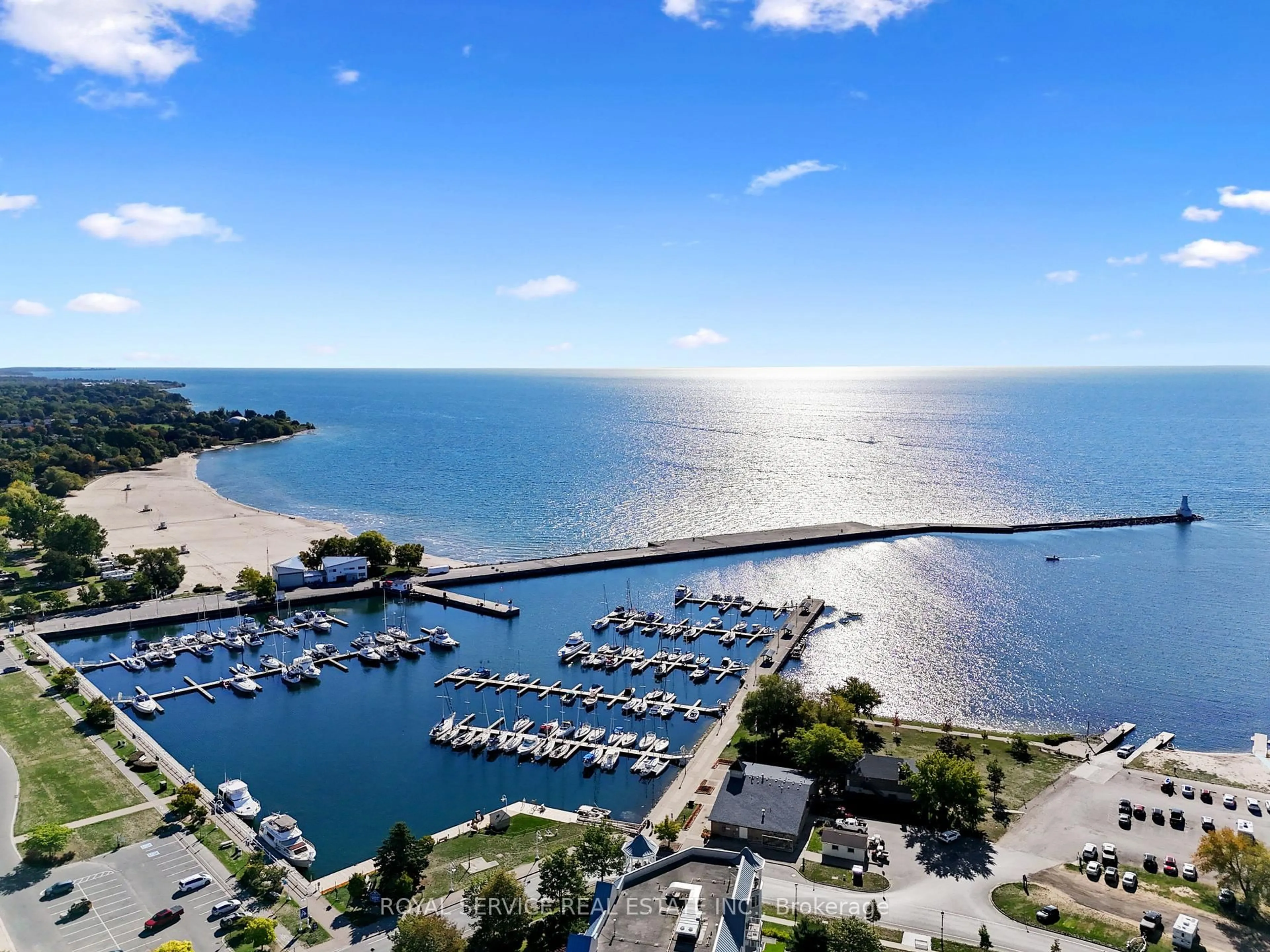 A pic from outside/outdoor area/front of a property/back of a property/a pic from drone, water/lake/river/ocean view for 107 Marissa Lane #301, Cobourg Ontario K9A 5N6
